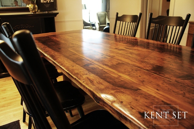 7 ft Trestle Table - 42" wide - Premium epoxy/matte polyurethane finish - Reclaimed Threshing Floor 2" Hemlock Top - Two 18" leaf extensions [making total length 9 ft when extended] - Two [matching] 42" benches - 8 Black Buckhorn chairs finish in black