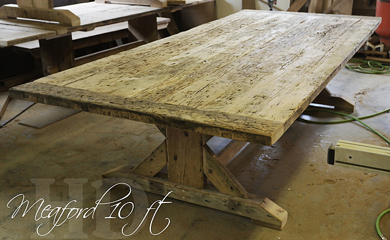 Specs: 10 ft Meaford Reclaimed Wood Sawbuck Table - 56" wide - 6" bread-edge boards - Reclaimed Threshing Floor Hemlock - Premium epoxy and matte polyurethane finish 