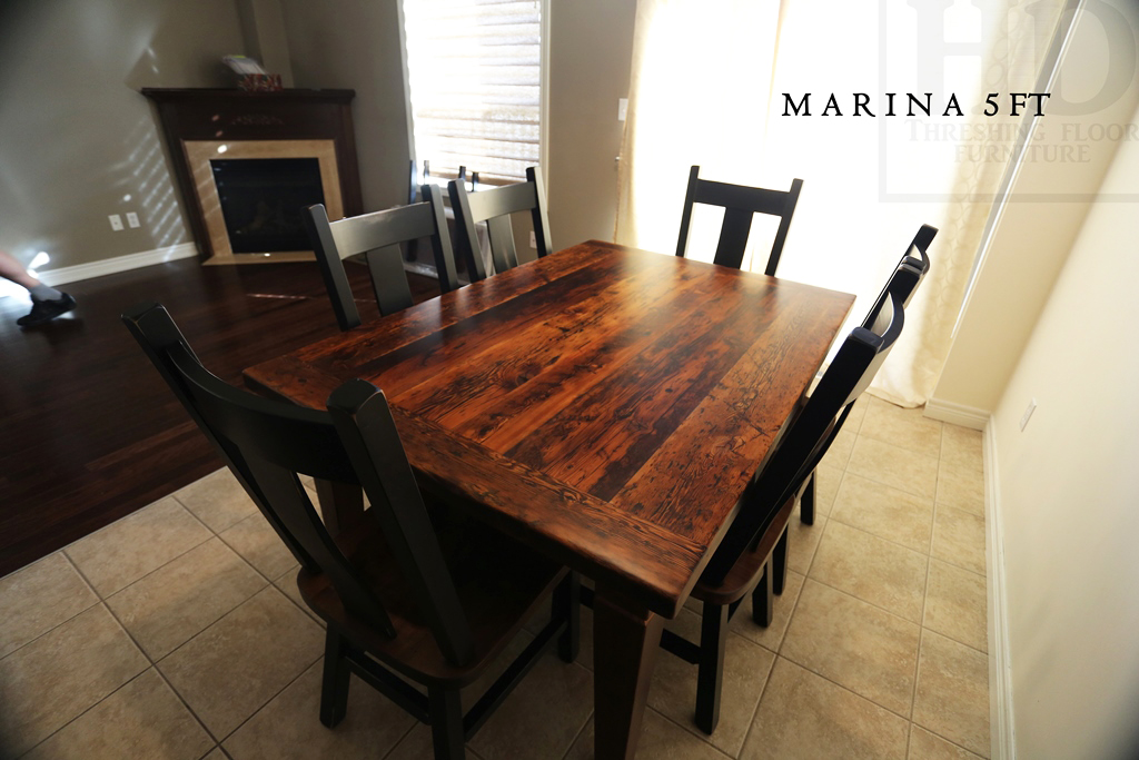 Specs: 5 ft Harvest Table - 42" wide - Reclaimed Hemlock Threshing Floor Top 2" - 4"x 4" Tapered with a Notch Legs - Premium epoxy + matte polyurethane finish - two 18" leaves - 6 Wormy Maple Plank Back Chairs Gerald Reinink