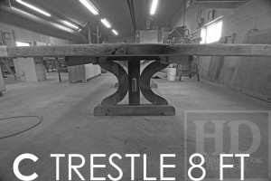 Specifications: 8 ft 'C' Trestle - 48" wide - Premium epoxy/matte polyurethane finish - Reclaimed Hemlock Thresing Floor 2" thick top - Two 24" leaf extensions