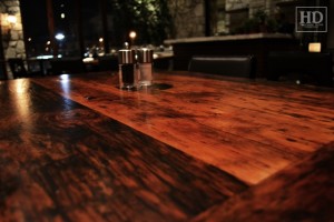 Custom restaurant tops –brand burnt in - Premium epoxy /matte polyurethane finish – Reclaimed Threshing Floor Pine – original edges - 2†thick threshing floor – bread-edge ends