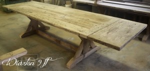 Details of job: 9 ft Sawbuck Table - 42" wide - Premium epoxy/matte polyurethane finish - Reclaimed Threshing Floor Hemlock - Two 18 inch end leaves - Two 42 inch benches