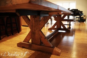 Details of job: 9 ft Sawbuck Table - 42" wide - Premium epoxy/matte polyurethane finish - Reclaimed Threshing Floor Hemlock - Two 18 inch end leaves - Two 42 inch benches