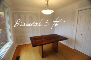 Details: 5 ft Reclaimed Wood Table - 36" wide - Reclaimed Hemlock - 3" plank posts style base - Premium epoxy/matte polyurethane finish Gerald Reinink