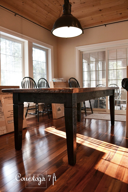Details: 7 ft Harvest Table - 38" wide - Reclaimed Pine Threshing Floor - Black skirting & Legs - Tapered with a Notch Legs - Premium epoxy/matte polyurethane finish