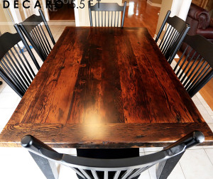 Specifications: 5.5 ft Harvest Table - 42" wide - Reclaimed Hemlock - Tapered with a Notch Legs - Black Skirting and Legs - Premium epoxy/matte polyurethane finish - 6 wormy maple Buckhorn chairs painted black with polyurethane clearcoat finish Gerald Reinink