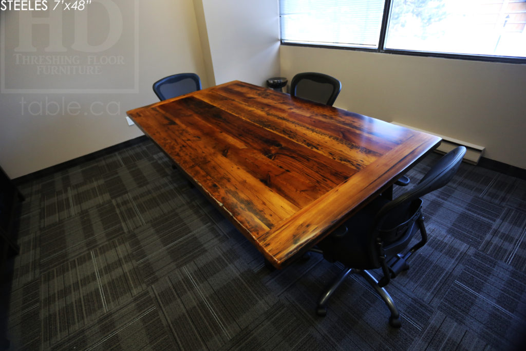 7' Reclaimed Wood Boardroom Table - 48" wide - Hemlock Threshing Floor Construction - Original edges & distressing maintained - Premium epoxy + satin polyurethane finish - Matte Black Metal Base - www.hdthreshing.com