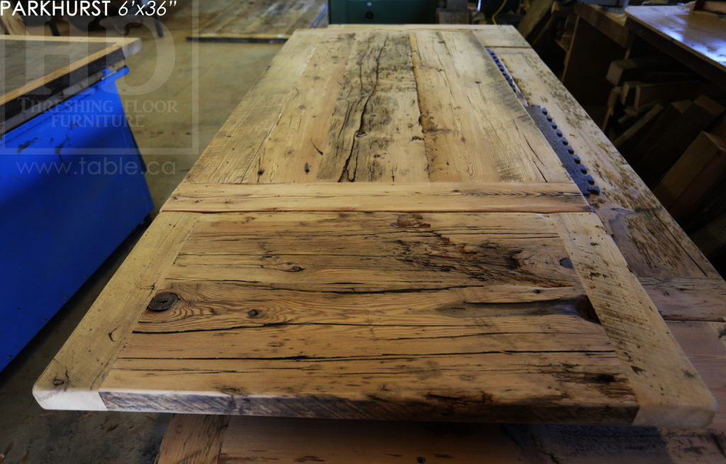 Description: 6' Reclaimed Wood Table - 36" wide - Black Metal Base with Rail - Original distressing/edges maintained - Hemlock Threshing Floor & Grainery Board Construction - Premium epoxy/satin polyurethane finish - One 18" Leaf - www.hdthreshing.com