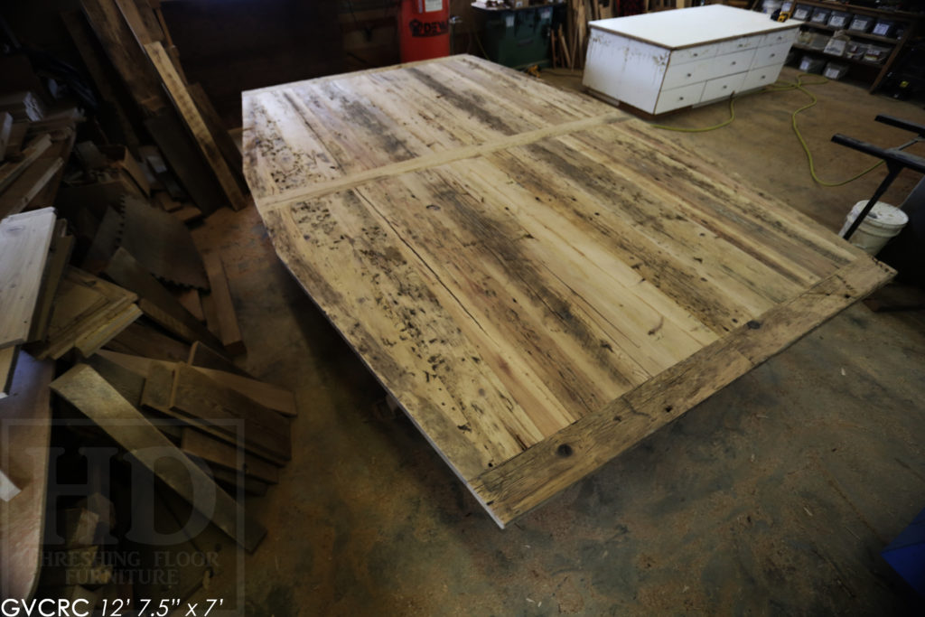 Details: 12' 7 1/2" Reclaimed Wood Consistory Table - 7' Wide at Centre - Custom Shape - Original Edges + Distressing Maintained - Hemlock Threshing Floor Construction - Premium epoxy + high gloss polyurethane finish - 3" Joist Material Plank Posts - www.hdthreshing.com