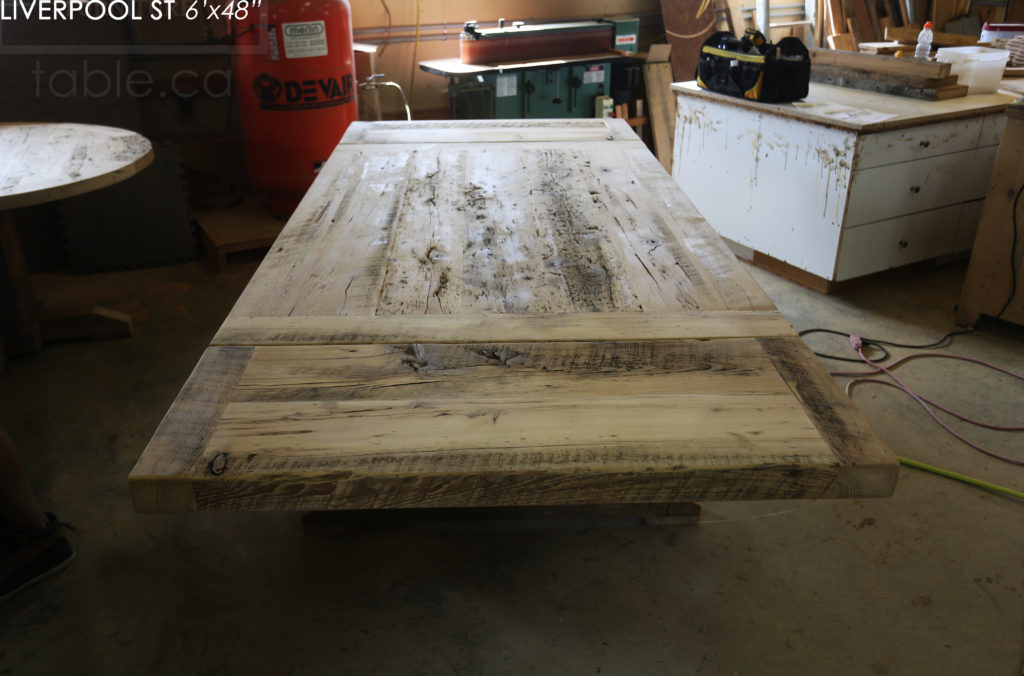 6' Reclaimed Wood Table for Oakville home - 48" wide - Sawbuck Base - Hemlock Threshing Floor Construction - Original edges & distressing maintained - Premium epoxy + satin polyurethane finish - Extra thick 3" Joist Material Top - Greytone Treatment to Maintain Colour of Unfinished - Two 18" Leaf Extensions - www.hdthreshing.com