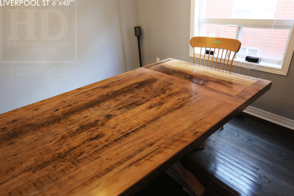 6' Reclaimed Wood Table for Oakville home - 48" wide - Sawbuck Base - Hemlock Threshing Floor Construction - Original edges & distressing maintained - Premium epoxy + satin polyurethane finish - Extra thick 3" Joist Material Top - Greytone Treatment to Maintain Colour of Unfinished - Two 18" Leaf Extensions - www.hdthreshing.com