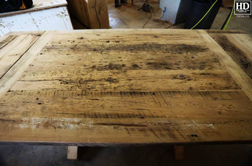 6' Reclaimed Wood Table for Oakville home - 48" wide - Sawbuck Base - Hemlock Threshing Floor Construction - Original edges & distressing maintained - Premium epoxy + satin polyurethane finish - Extra thick 3" Joist Material Top - Greytone Treatment to Maintain Colour of Unfinished - Two 18" Leaf Extensions - www.hdthreshing.com