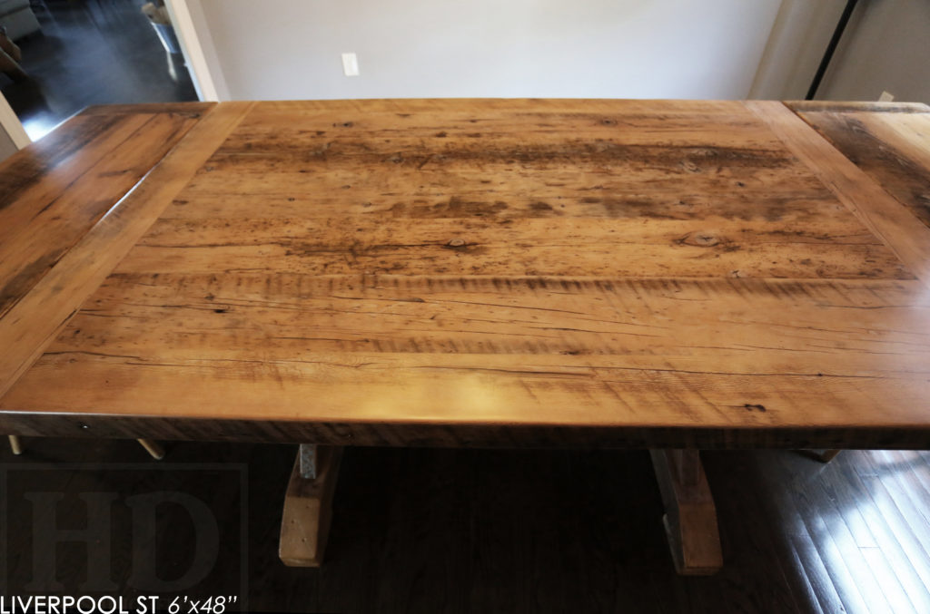 6' Reclaimed Wood Table for Oakville home - 48" wide - Sawbuck Base - Hemlock Threshing Floor Construction - Original edges & distressing maintained - Premium epoxy + satin polyurethane finish - Extra thick 3" Joist Material Top - Greytone Treatment to Maintain Colour of Unfinished - Two 18" Leaf Extensions - www.hdthreshing.com