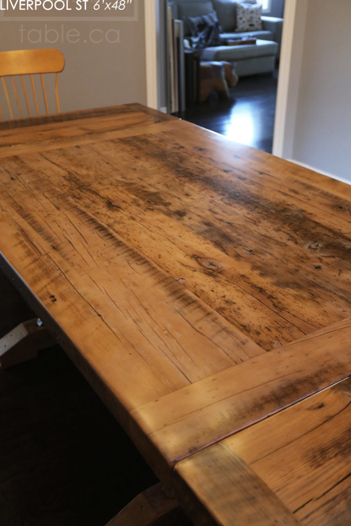 6' Reclaimed Wood Table for Oakville home - 48" wide - Sawbuck Base - Hemlock Threshing Floor Construction - Original edges & distressing maintained - Premium epoxy + satin polyurethane finish - Extra thick 3" Joist Material Top - Greytone Treatment to Maintain Colour of Unfinished - Two 18" Leaf Extensions - www.hdthreshing.com