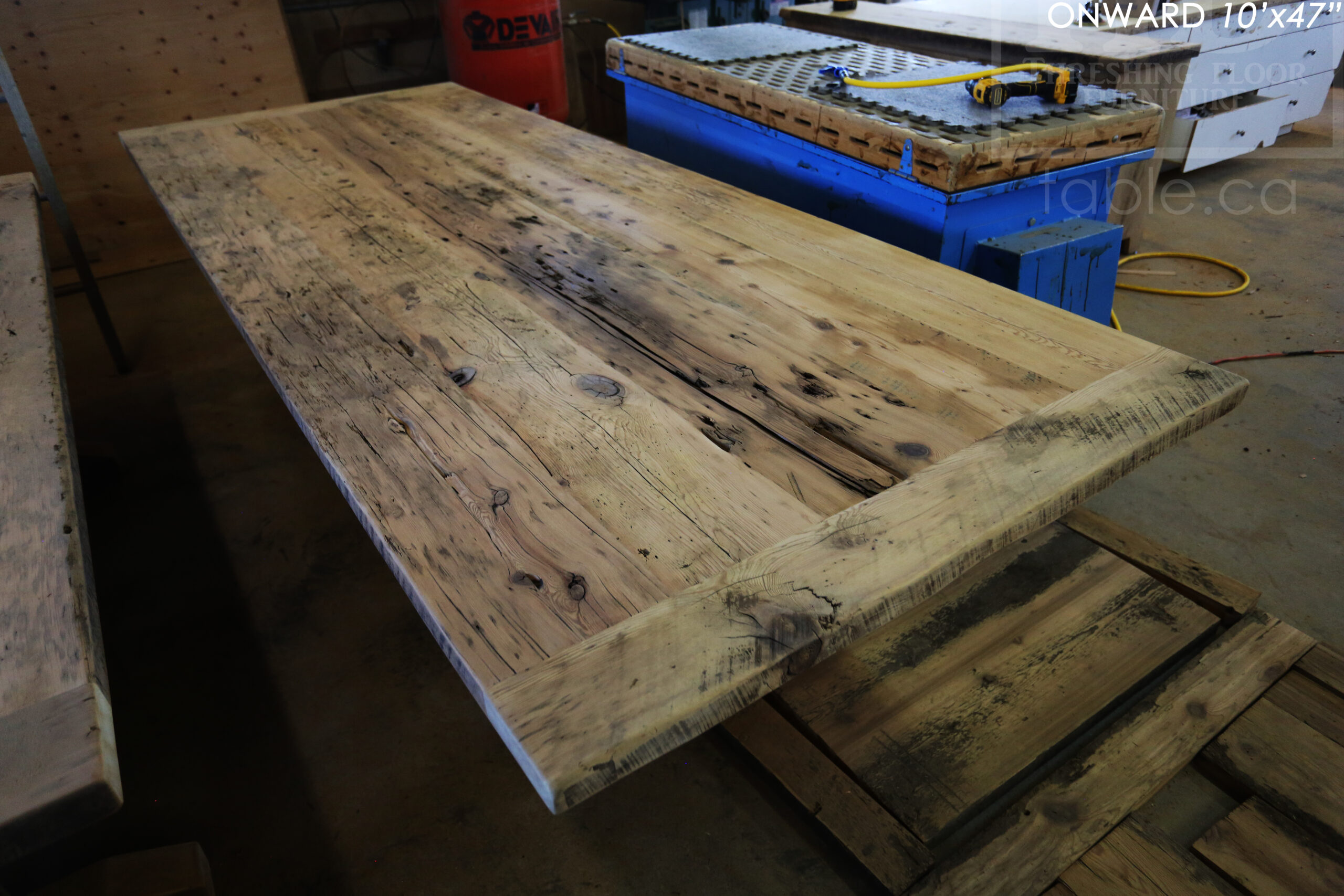 10 ft Reclaimed Wood Boardroom Table - 47" wide - Reclaimed Hemlock Threshing Floor Construction - Original edges & distressing maintained - Modern Plank style base - Custom metal logo routered into top - Premium epoxy + satin polyurethane finish / www.table.ca