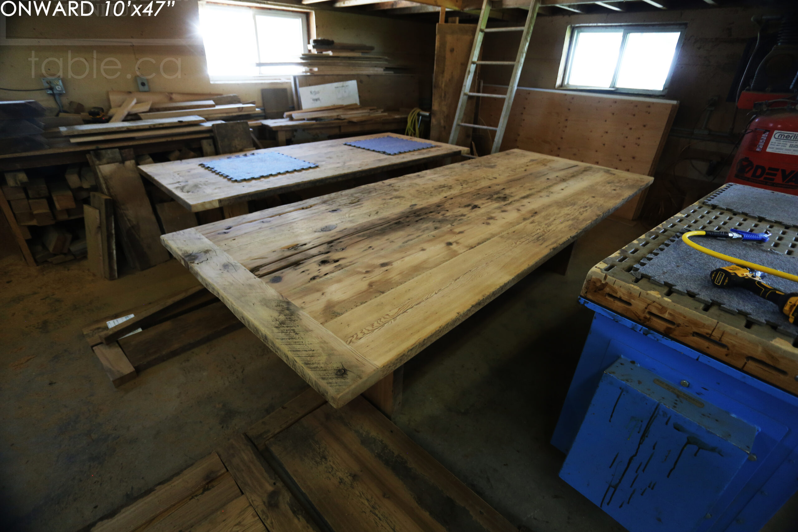 10 ft Reclaimed Wood Boardroom Table - 47" wide - Reclaimed Hemlock Threshing Floor Construction - Original edges & distressing maintained - Modern Plank style base - Custom metal logo routered into top - Premium epoxy + satin polyurethane finish / www.table.ca