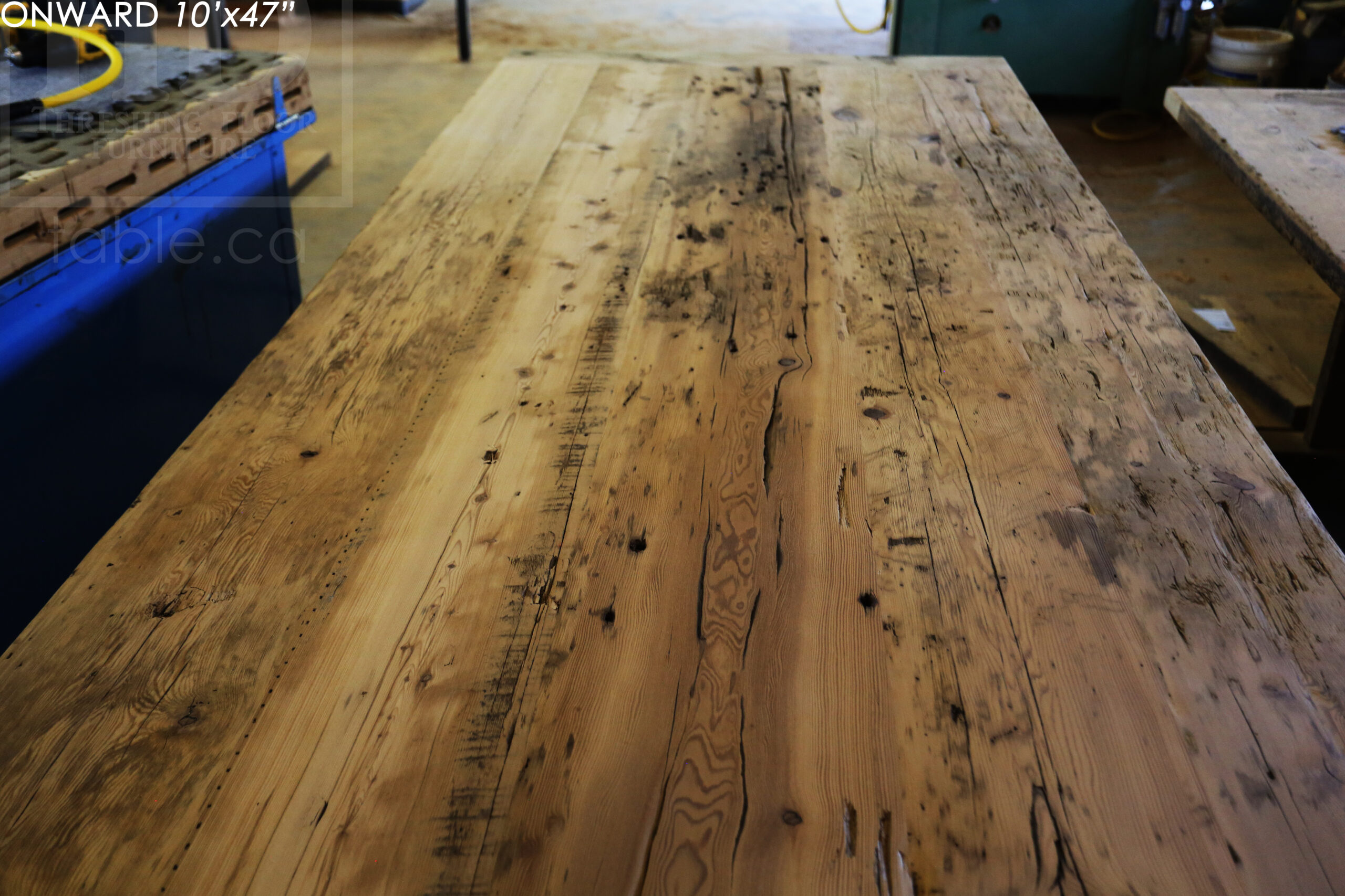 10 ft Reclaimed Wood Boardroom Table - 47" wide - Reclaimed Hemlock Threshing Floor Construction - Original edges & distressing maintained - Modern Plank style base - Custom metal logo routered into top - Premium epoxy + satin polyurethane finish / www.table.ca