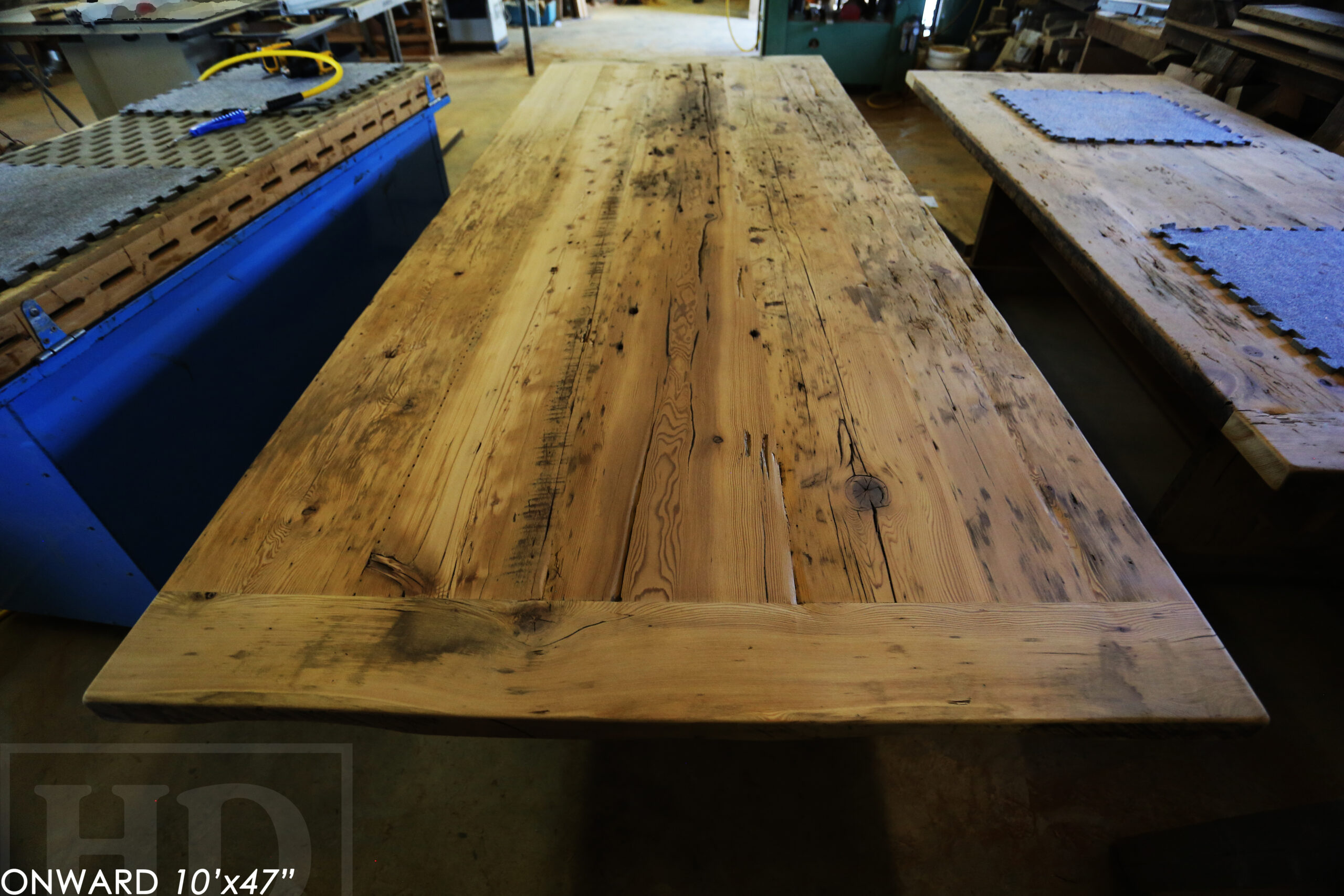 10 ft Reclaimed Wood Boardroom Table - 47" wide - Reclaimed Hemlock Threshing Floor Construction - Original edges & distressing maintained - Modern Plank style base - Custom metal logo routered into top - Premium epoxy + satin polyurethane finish / www.table.ca