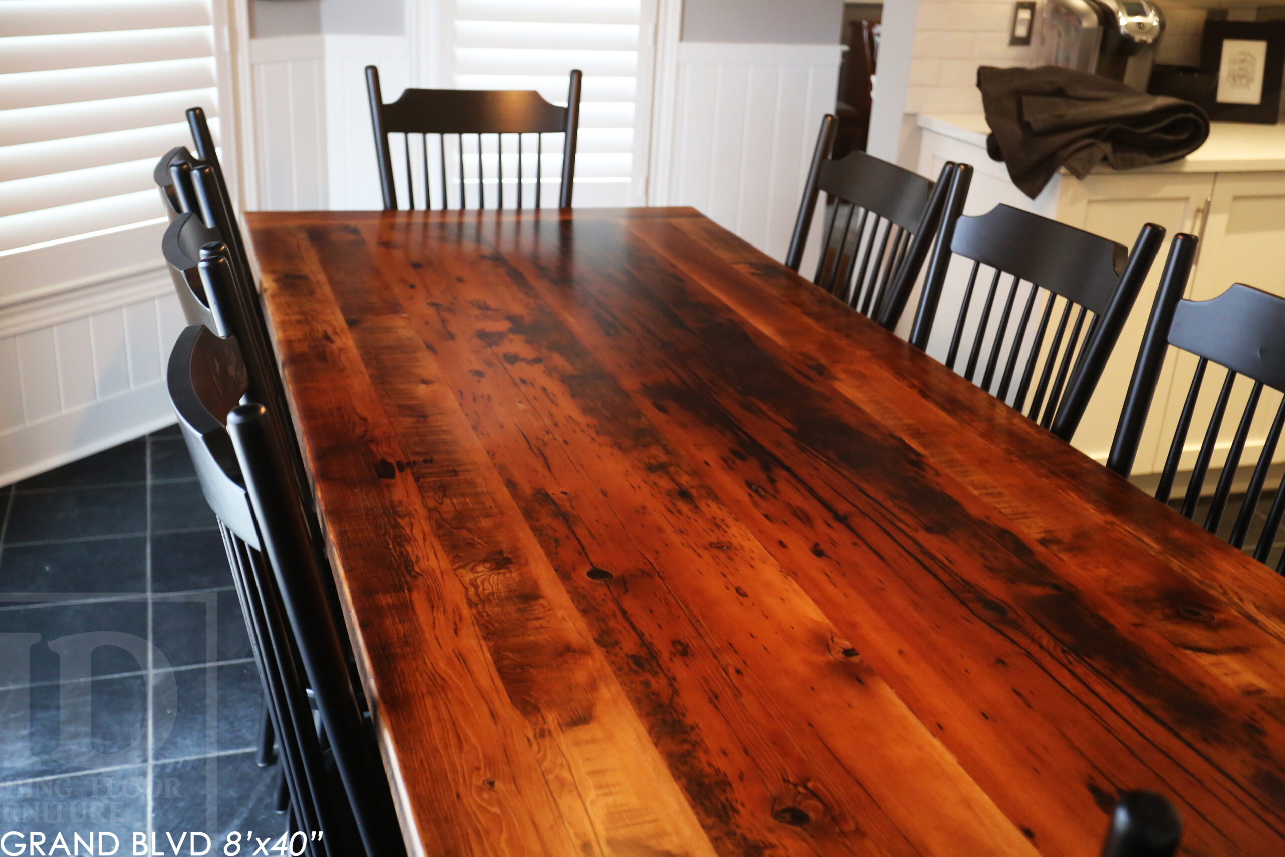 96" Reclaimed Wood Table for an Oakville home - 40" wide - Hemlock Threshing Floor Barnwood Construction - Original edges & distressing maintained - Matte Black Metal Base - Premium epoxy + satin polyurethane finish - 8 Buckhorn Chairs / Wormy Maple / Solid Black Painted / satin polyurethane finish / www.table.ca