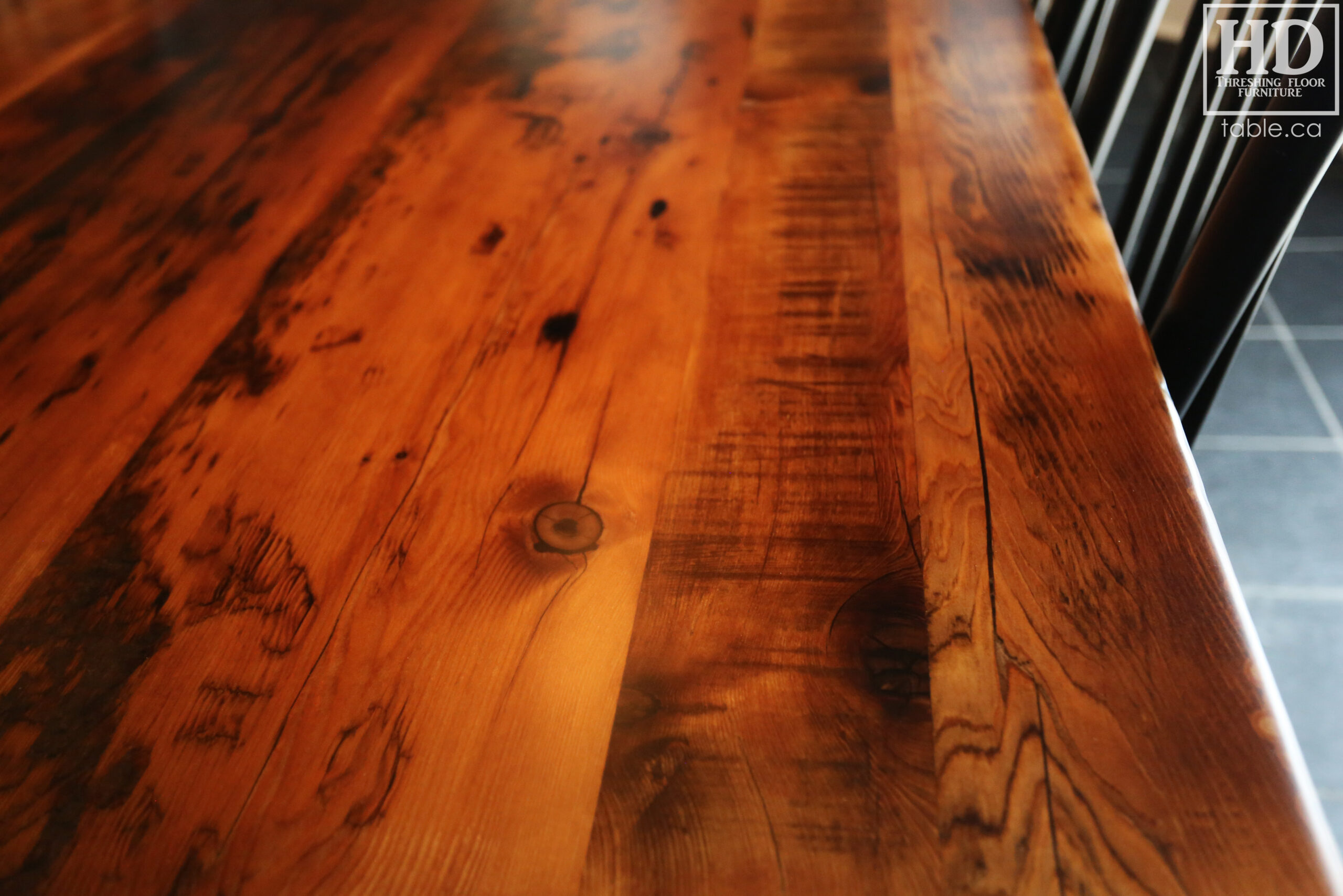 96" Reclaimed Wood Table for an Oakville home - 40" wide - Hemlock Threshing Floor Barnwood Construction - Original edges & distressing maintained - Matte Black Metal Base - Premium epoxy + satin polyurethane finish - 8 Buckhorn Chairs / Wormy Maple / Solid Black Painted / satin polyurethane finish / www.table.ca