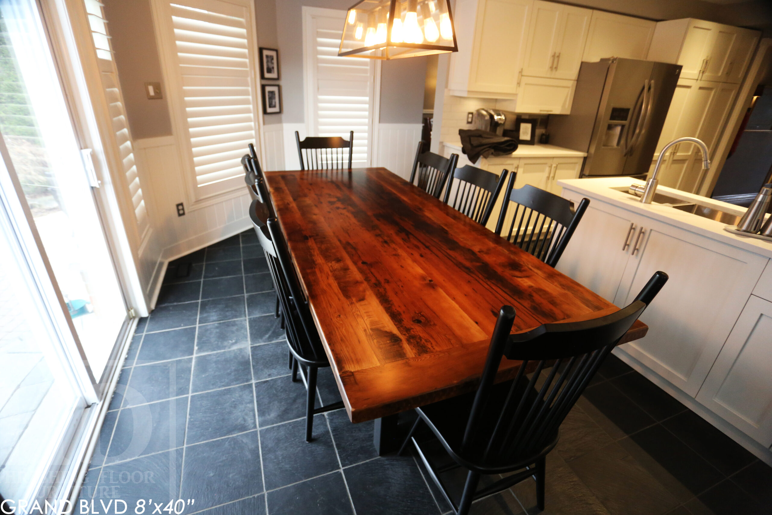 96" Reclaimed Wood Table for an Oakville home - 40" wide - Hemlock Threshing Floor Barnwood Construction - Original edges & distressing maintained - Matte Black Metal Base - Premium epoxy + satin polyurethane finish - 8 Buckhorn Chairs / Wormy Maple / Solid Black Painted / satin polyurethane finish / www.table.ca