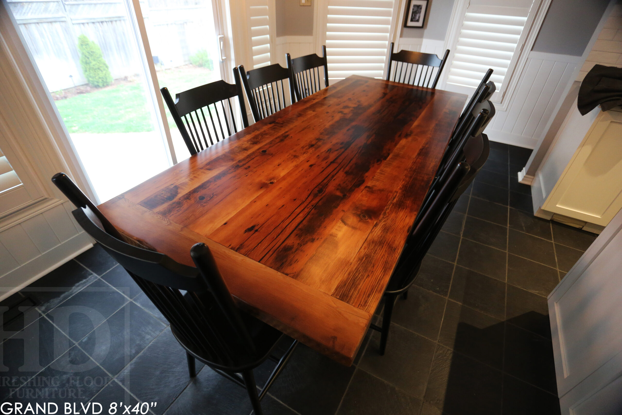 96" Reclaimed Wood Table for an Oakville home - 40" wide - Hemlock Threshing Floor Barnwood Construction - Original edges & distressing maintained - Matte Black Metal Base - Premium epoxy + satin polyurethane finish - 8 Buckhorn Chairs / Wormy Maple / Solid Black Painted / satin polyurethane finish / www.table.ca