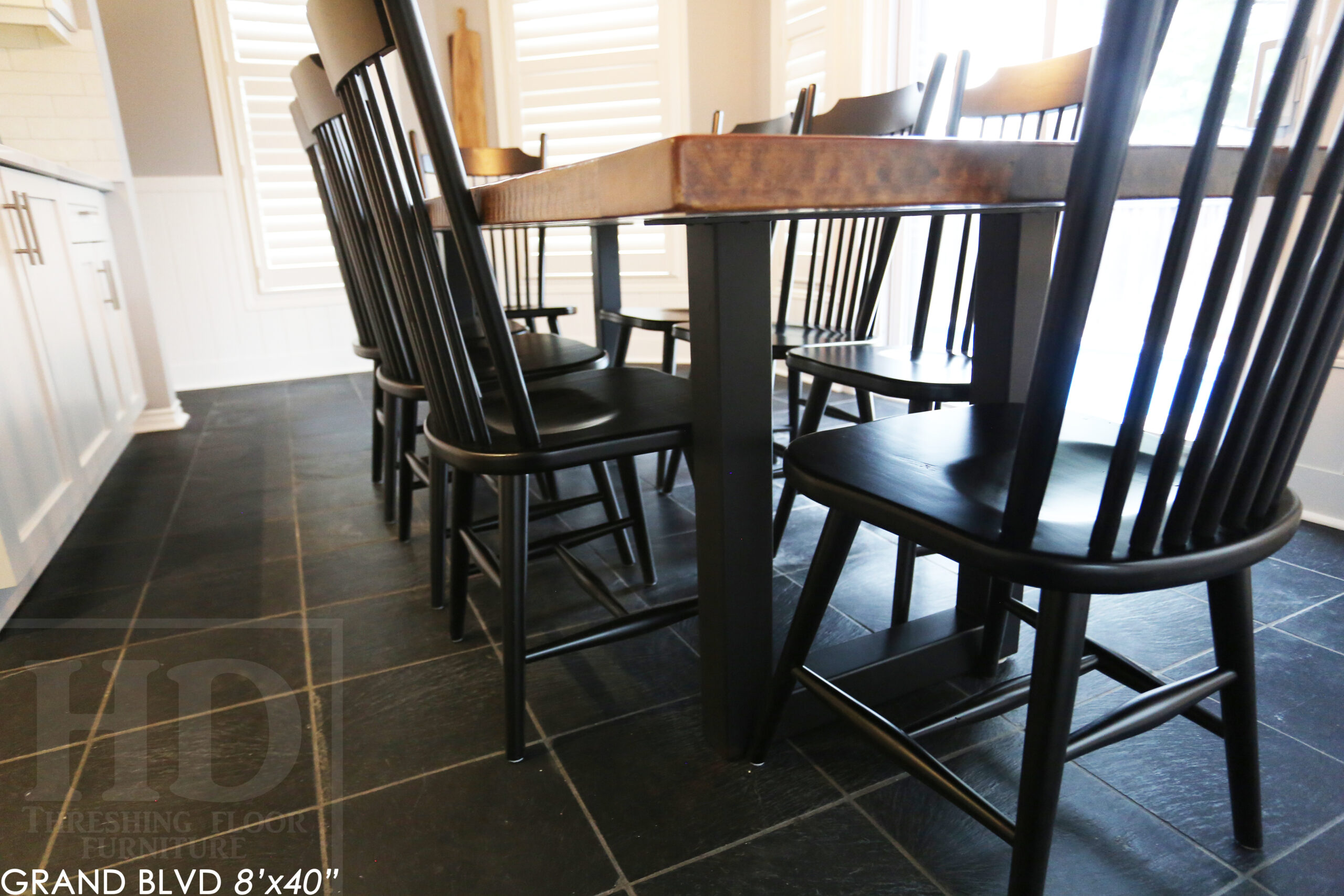 96" Reclaimed Wood Table for an Oakville home - 40" wide - Hemlock Threshing Floor Barnwood Construction - Original edges & distressing maintained - Matte Black Metal Base - Premium epoxy + satin polyurethane finish - 8 Buckhorn Chairs / Wormy Maple / Solid Black Painted / satin polyurethane finish / www.table.ca