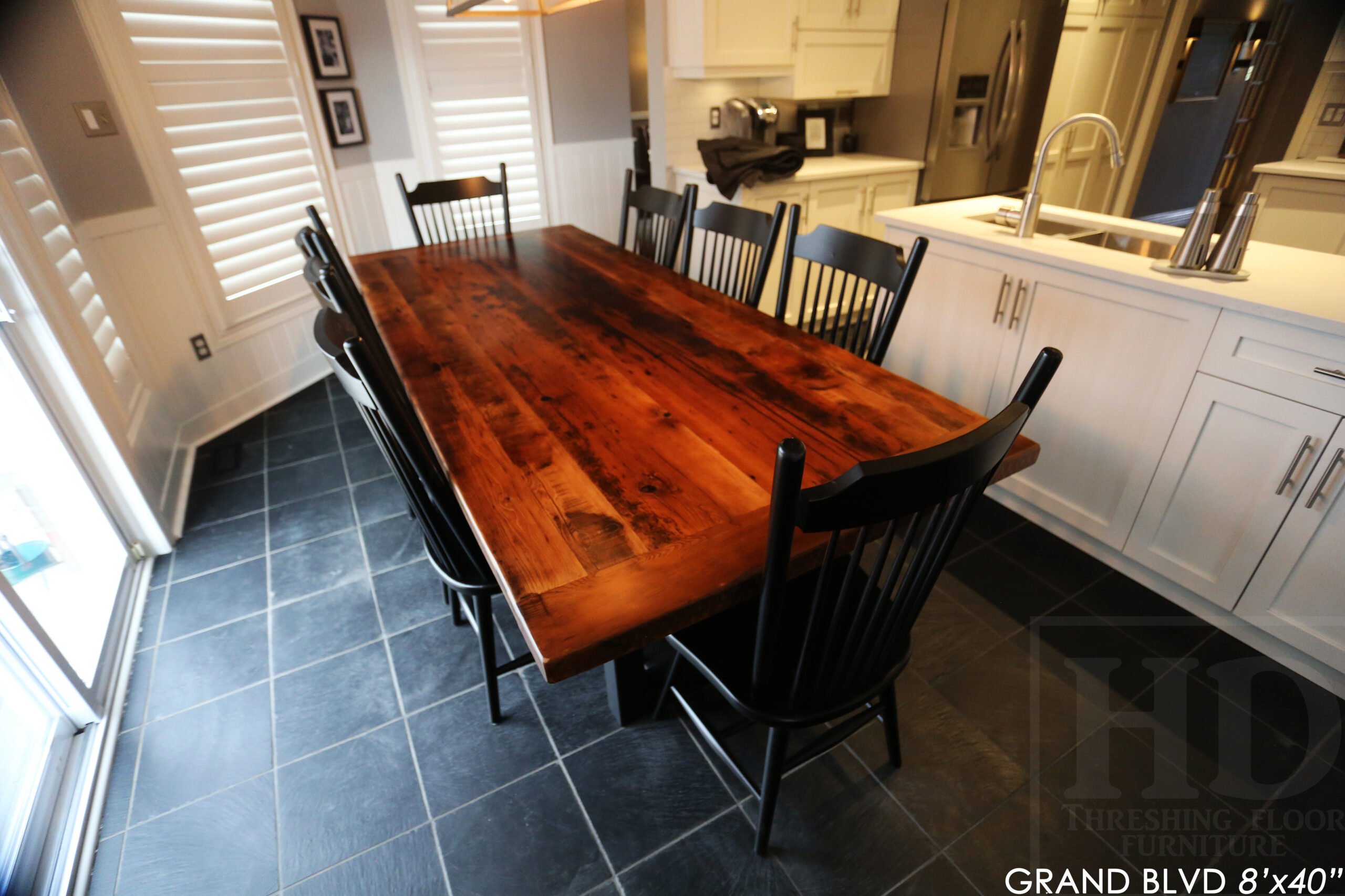 96" Reclaimed Wood Table for an Oakville home - 40" wide - Hemlock Threshing Floor Barnwood Construction - Original edges & distressing maintained - Matte Black Metal Base - Premium epoxy + satin polyurethane finish - 8 Buckhorn Chairs / Wormy Maple / Solid Black Painted / satin polyurethane finish / www.table.ca