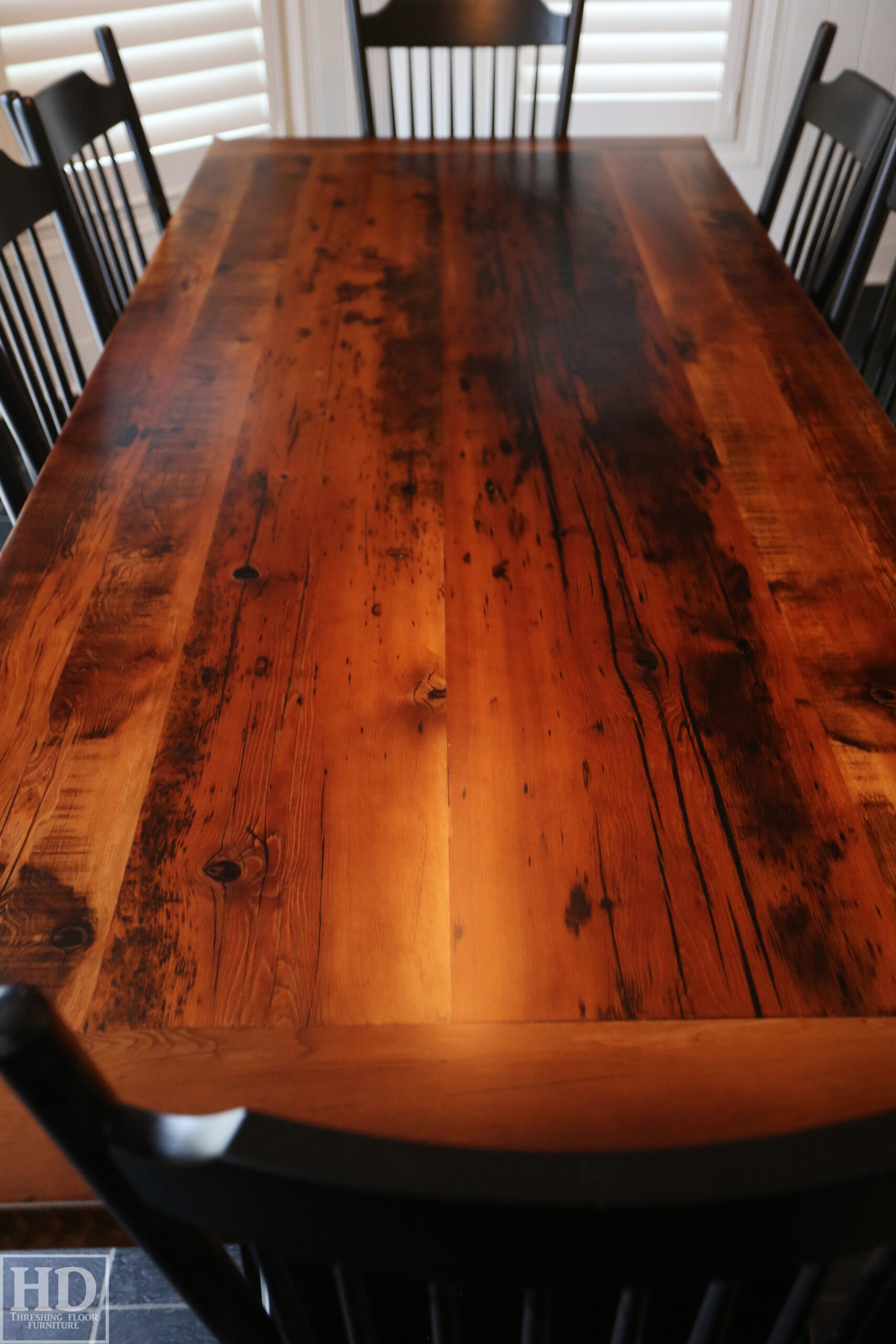 96" Reclaimed Wood Table for an Oakville home - 40" wide - Hemlock Threshing Floor Barnwood Construction - Original edges & distressing maintained - Matte Black Metal Base - Premium epoxy + satin polyurethane finish - 8 Buckhorn Chairs / Wormy Maple / Solid Black Painted / satin polyurethane finish / www.table.ca