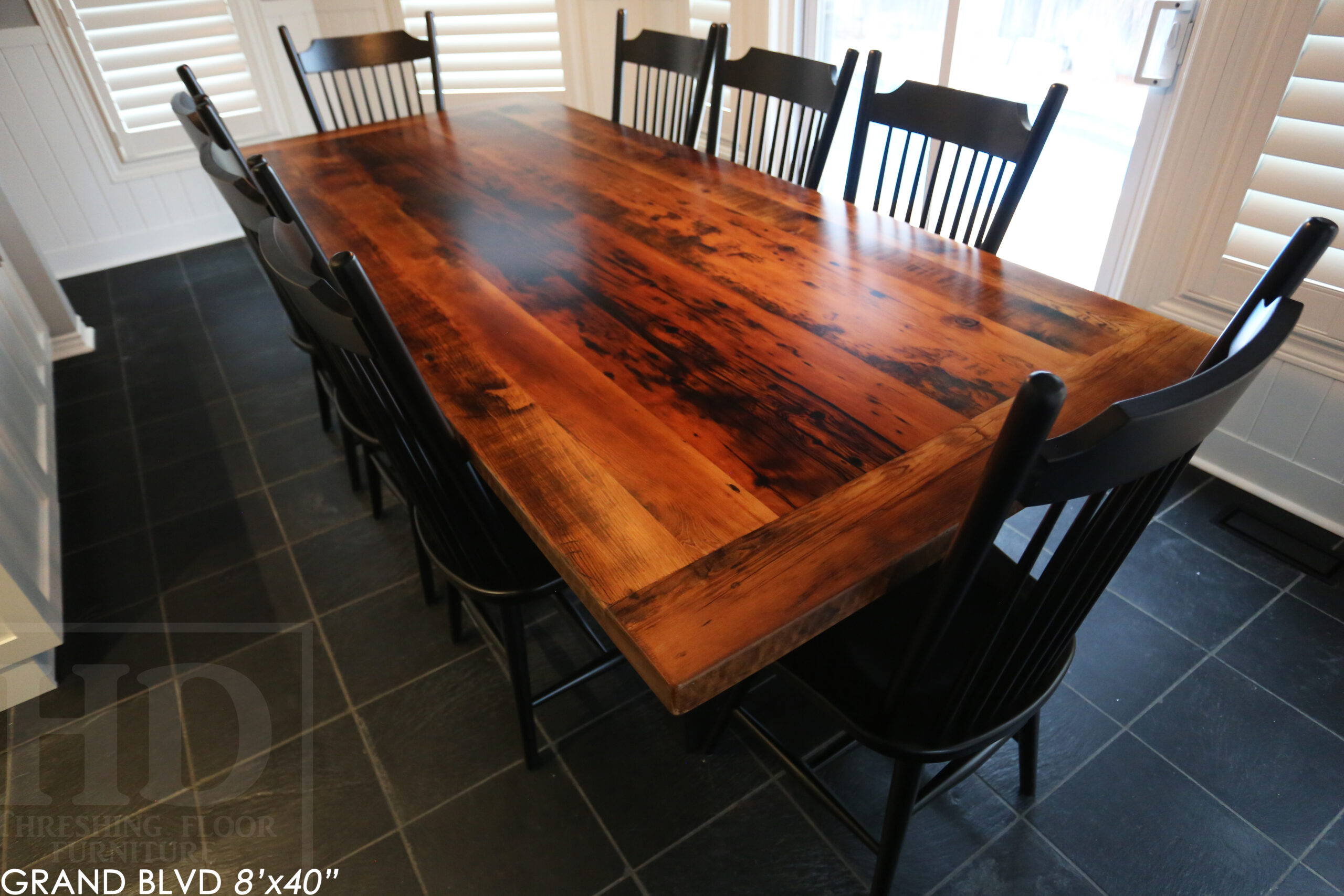 96" Reclaimed Wood Table for an Oakville home - 40" wide - Hemlock Threshing Floor Barnwood Construction - Original edges & distressing maintained - Matte Black Metal Base - Premium epoxy + satin polyurethane finish - 8 Buckhorn Chairs / Wormy Maple / Solid Black Painted / satin polyurethane finish / www.table.ca