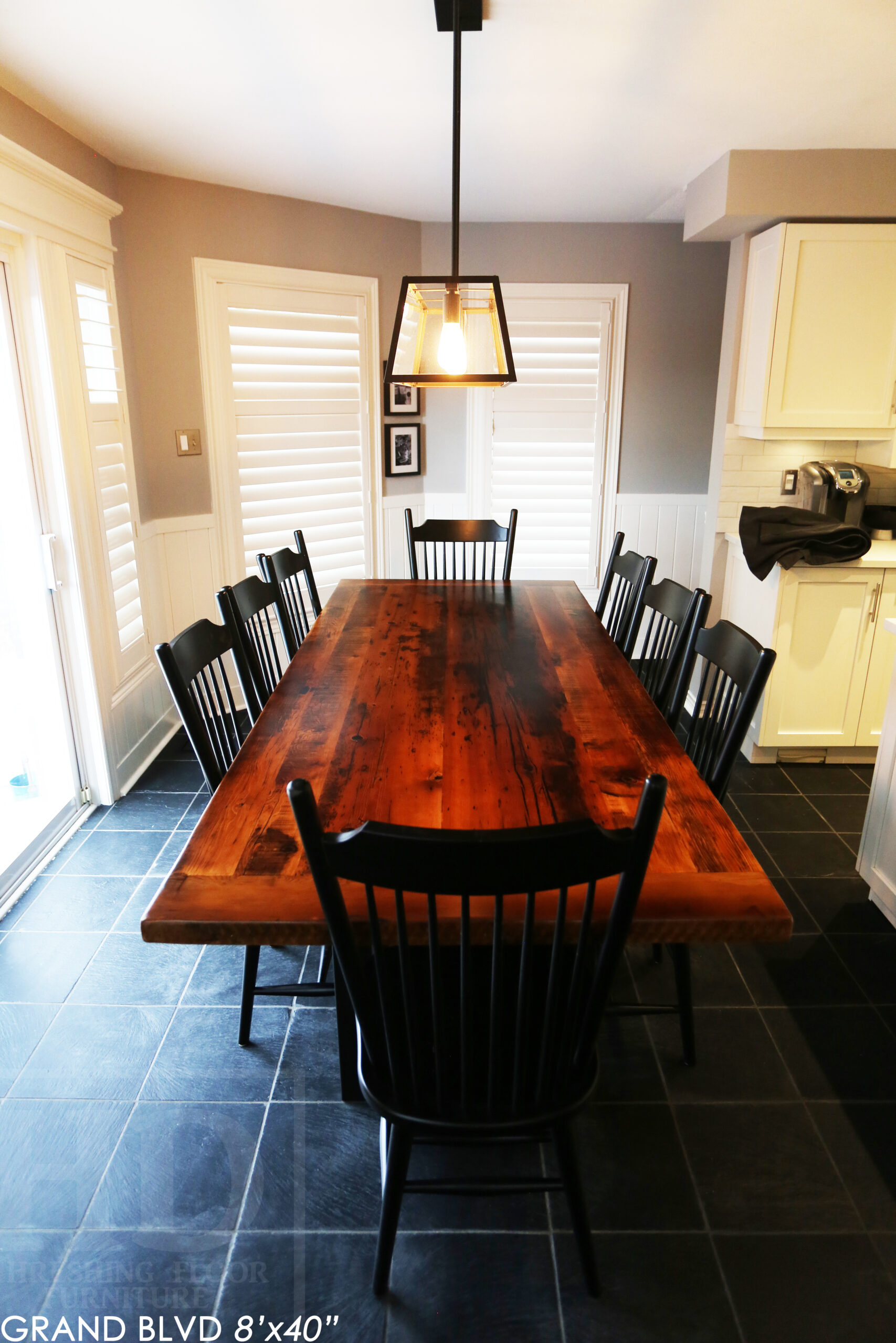 96" Reclaimed Wood Table for an Oakville home - 40" wide - Hemlock Threshing Floor Barnwood Construction - Original edges & distressing maintained - Matte Black Metal Base - Premium epoxy + satin polyurethane finish - 8 Buckhorn Chairs / Wormy Maple / Solid Black Painted / satin polyurethane finish / www.table.ca