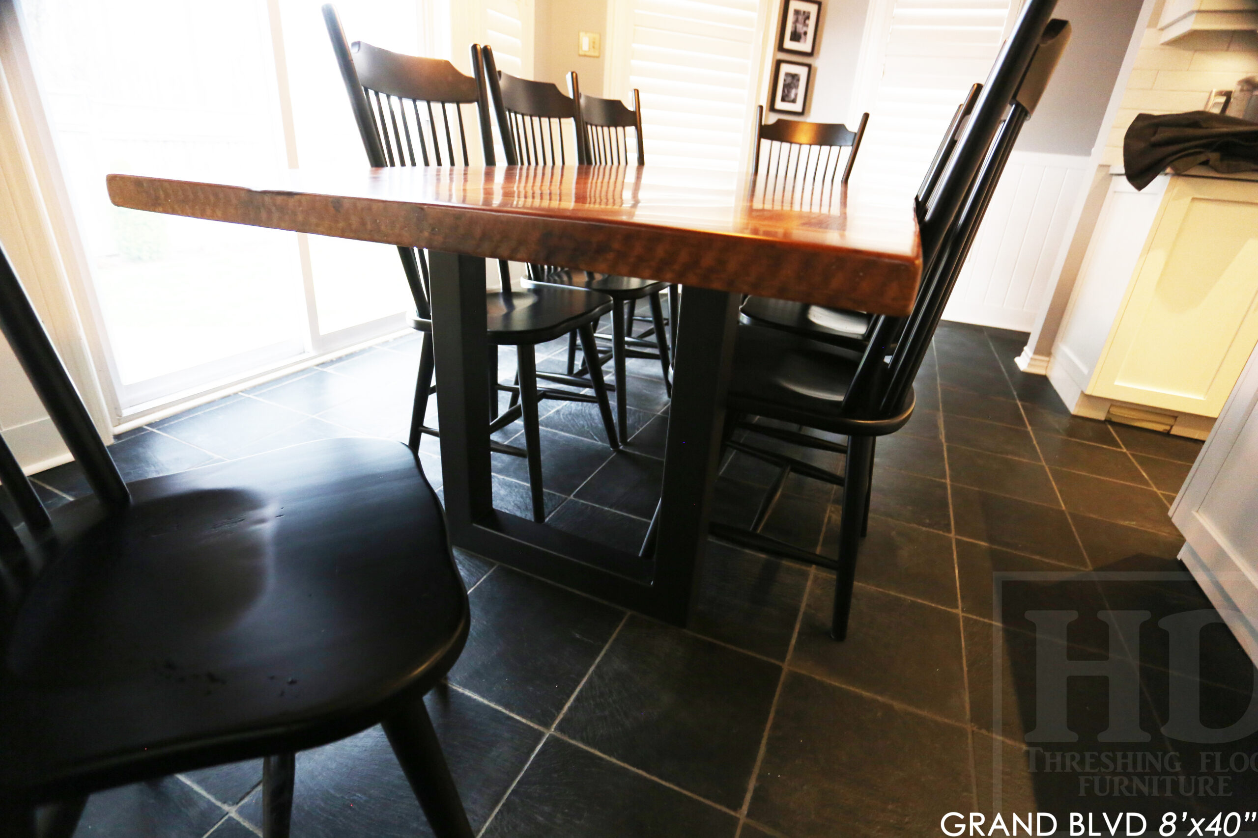 96" Reclaimed Wood Table for an Oakville home - 40" wide - Hemlock Threshing Floor Barnwood Construction - Original edges & distressing maintained - Matte Black Metal Base - Premium epoxy + satin polyurethane finish - 8 Buckhorn Chairs / Wormy Maple / Solid Black Painted / satin polyurethane finish / www.table.ca