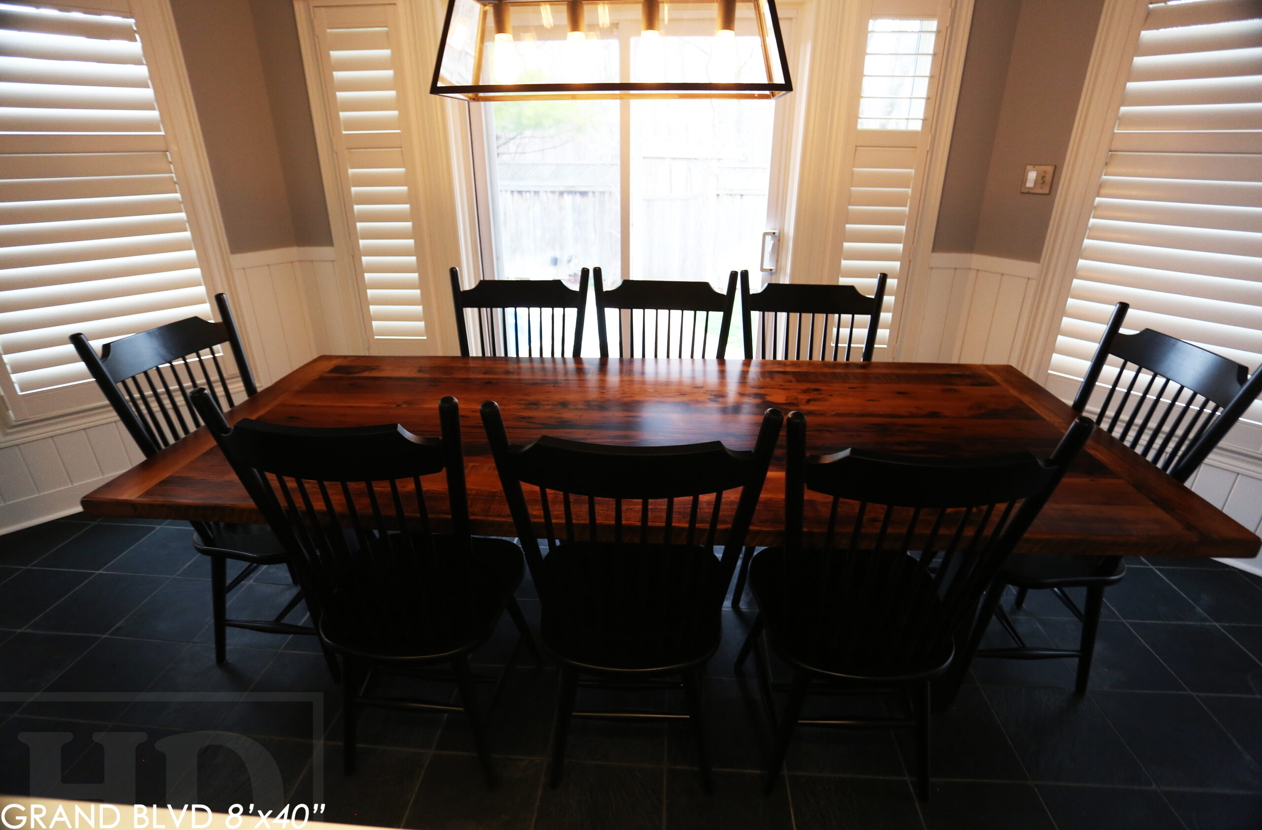 96" Reclaimed Wood Table for an Oakville home - 40" wide - Hemlock Threshing Floor Barnwood Construction - Original edges & distressing maintained - Matte Black Metal Base - Premium epoxy + satin polyurethane finish - 8 Buckhorn Chairs / Wormy Maple / Solid Black Painted / satin polyurethane finish / www.table.ca