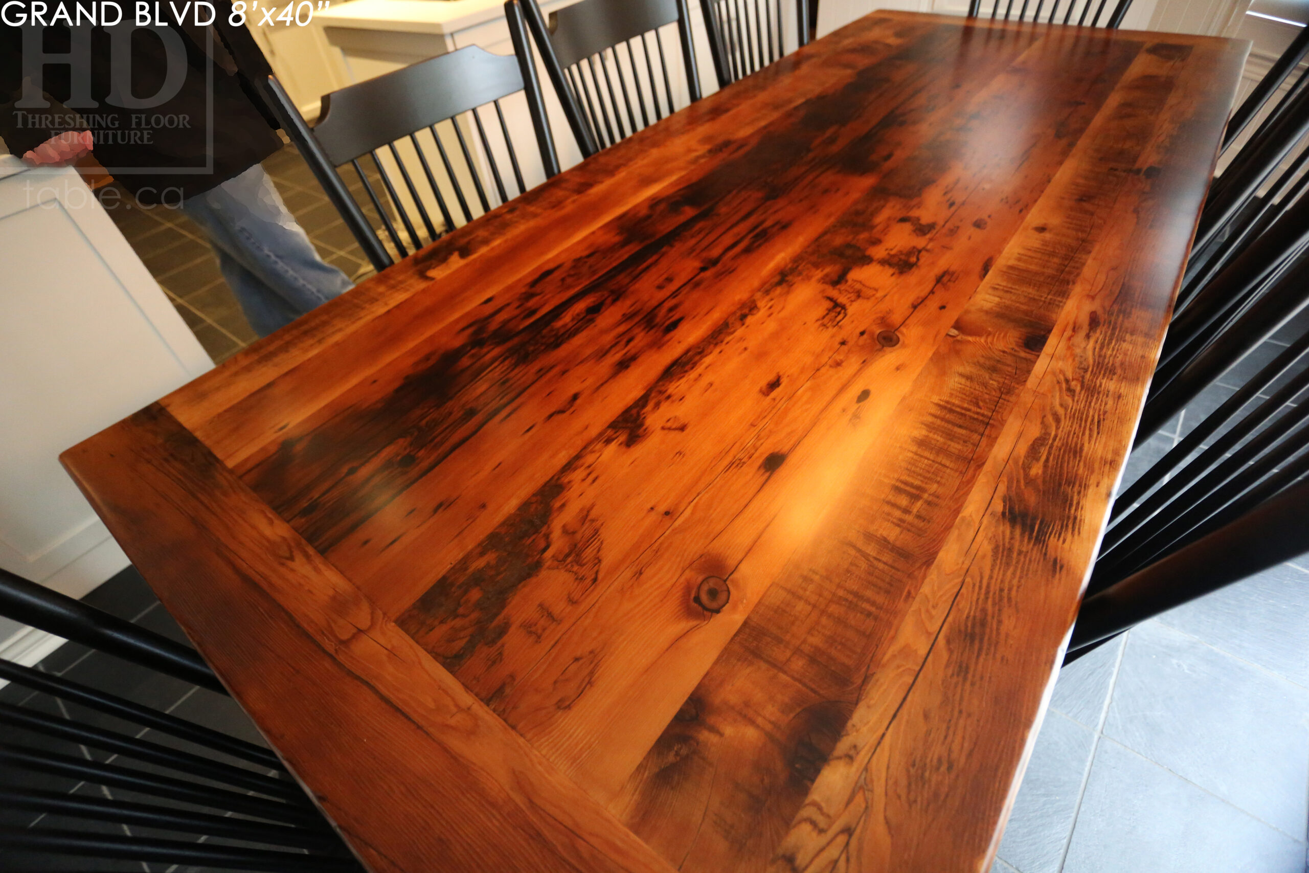 96" Reclaimed Wood Table for an Oakville home - 40" wide - Hemlock Threshing Floor Barnwood Construction - Original edges & distressing maintained - Matte Black Metal Base - Premium epoxy + satin polyurethane finish - 8 Buckhorn Chairs / Wormy Maple / Solid Black Painted / satin polyurethane finish / www.table.ca