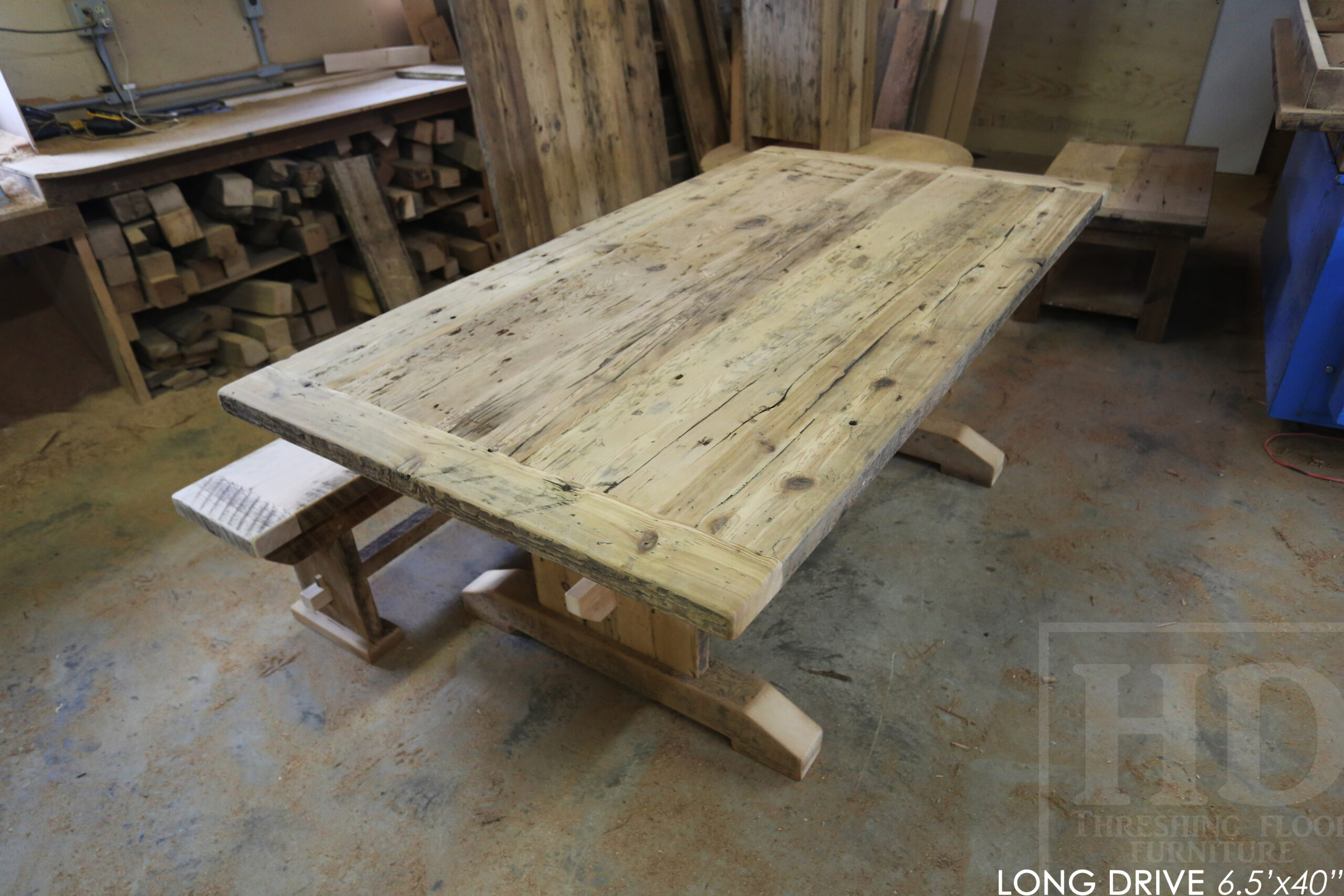 6.5' Reclaimed Wood Table for a Burlington home - 42" wide - Trestle Base - Hemlock Threshing Floor Construction / Medium Sanding out of Original Patina - Original edges & distressing maintained - Premium epoxy + satin polyurethane finish - 6.5' [matching] Reclaimed wood bench - 5 Non-arm Ladder Back Chairs - Wormy Maple - Black with sandthroughs frame / seat stained colour of table / www.table.ca