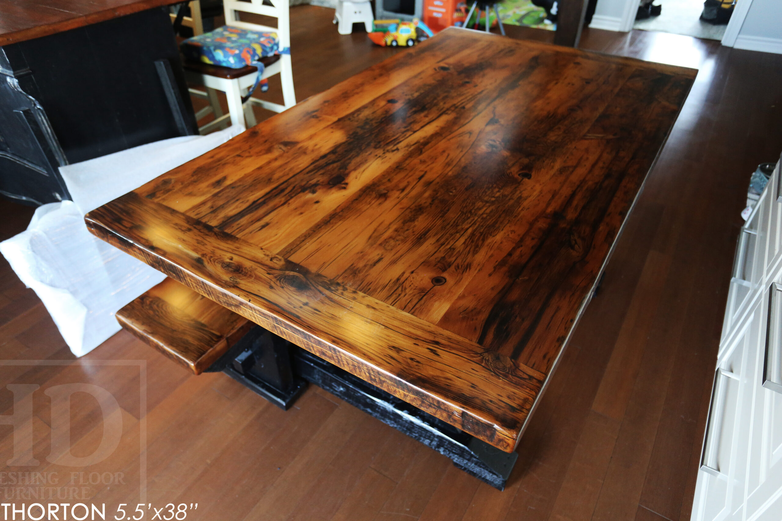 5.5' Reclaimed Wood Table we made for an Ontario home - 38" wide - Sawbuck Base / Painted Black - Old Growth Hemlock Threshing Floor Construction - Original edges & distressing maintained - Premium epoxy + satin polyurethane finish - 5' Trestle Bench - www.table.ca