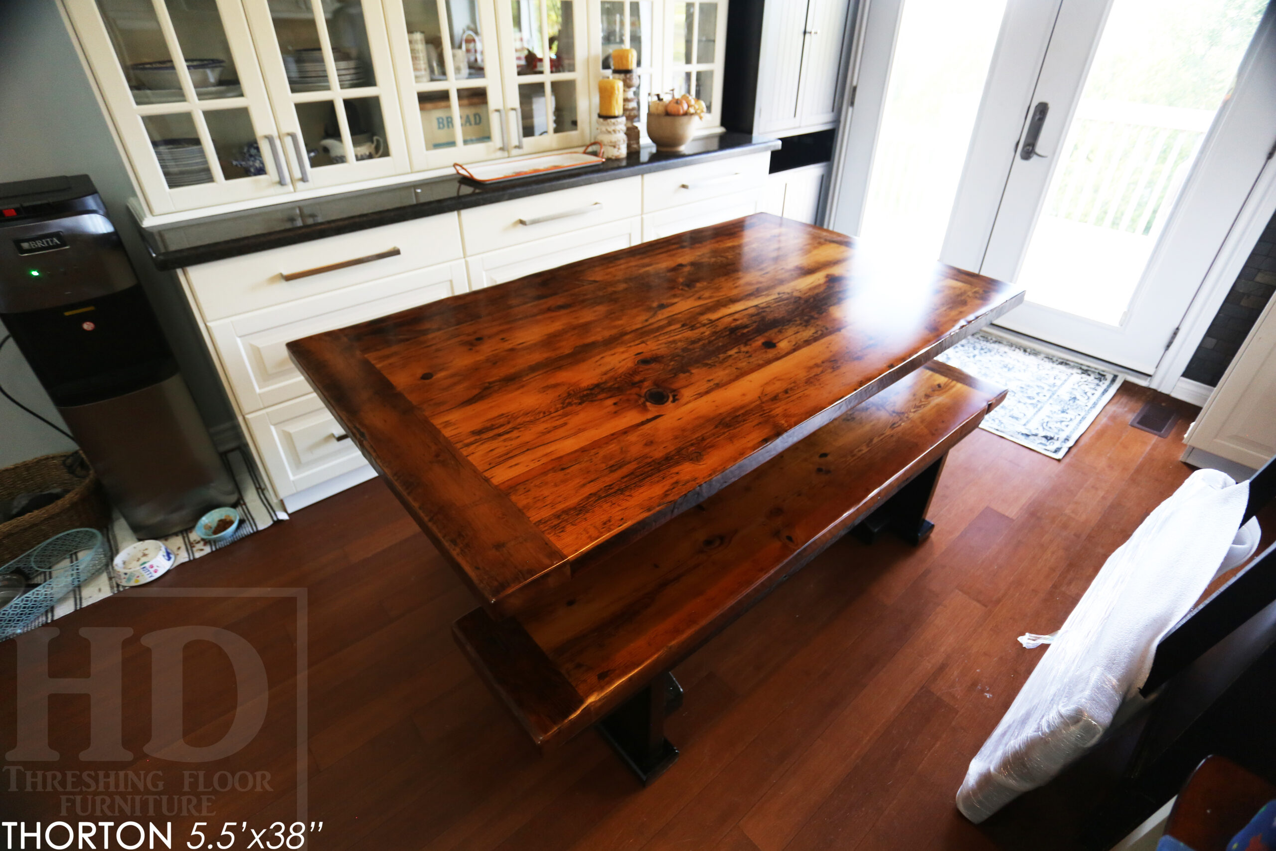 5.5' Reclaimed Wood Table we made for an Ontario home - 38" wide - Sawbuck Base / Painted Black - Old Growth Hemlock Threshing Floor Construction - Original edges & distressing maintained - Premium epoxy + satin polyurethane finish - 5' Trestle Bench - www.table.ca