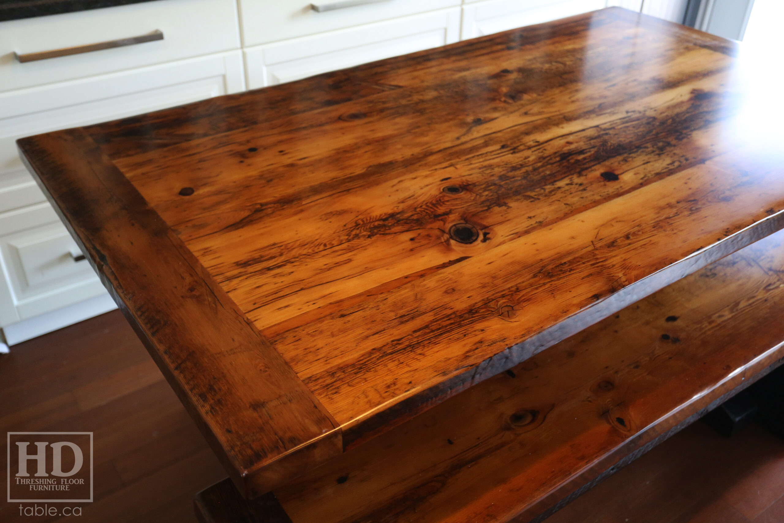 5.5' Reclaimed Wood Table we made for an Ontario home - 38" wide - Sawbuck Base / Painted Black - Old Growth Hemlock Threshing Floor Construction - Original edges & distressing maintained - Premium epoxy + satin polyurethane finish - 5' Trestle Bench - www.table.ca