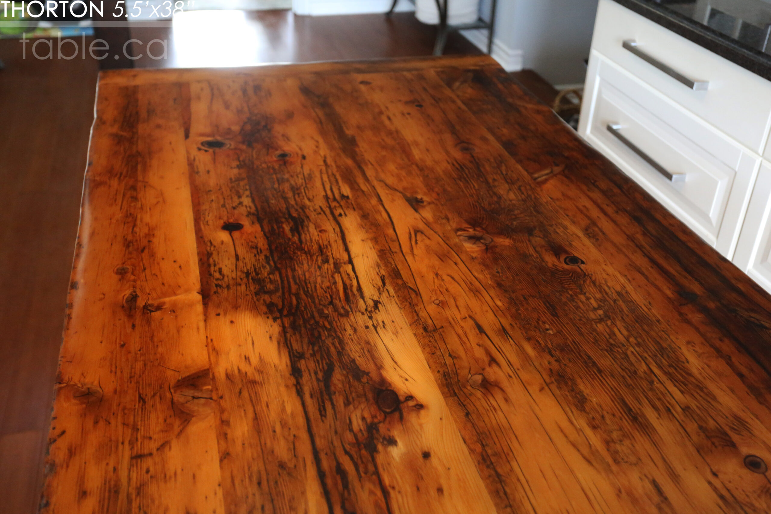 5.5' Reclaimed Wood Table we made for an Ontario home - 38" wide - Sawbuck Base / Painted Black - Old Growth Hemlock Threshing Floor Construction - Original edges & distressing maintained - Premium epoxy + satin polyurethane finish - 5' Trestle Bench - www.table.ca