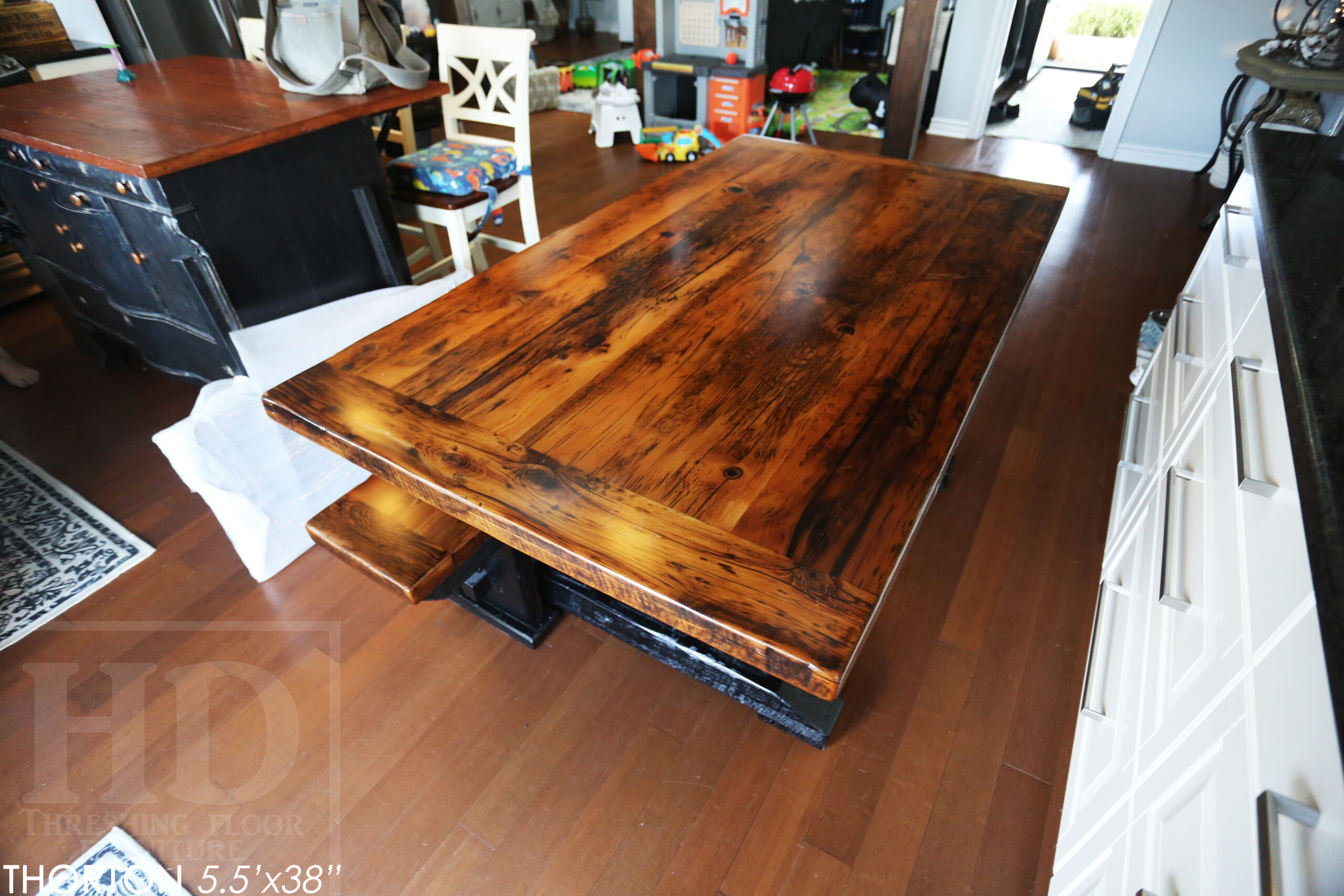 5.5' Reclaimed Wood Table we made for an Ontario home - 38" wide - Sawbuck Base / Painted Black - Old Growth Hemlock Threshing Floor Construction - Original edges & distressing maintained - Premium epoxy + satin polyurethane finish - 5' Trestle Bench - www.table.ca