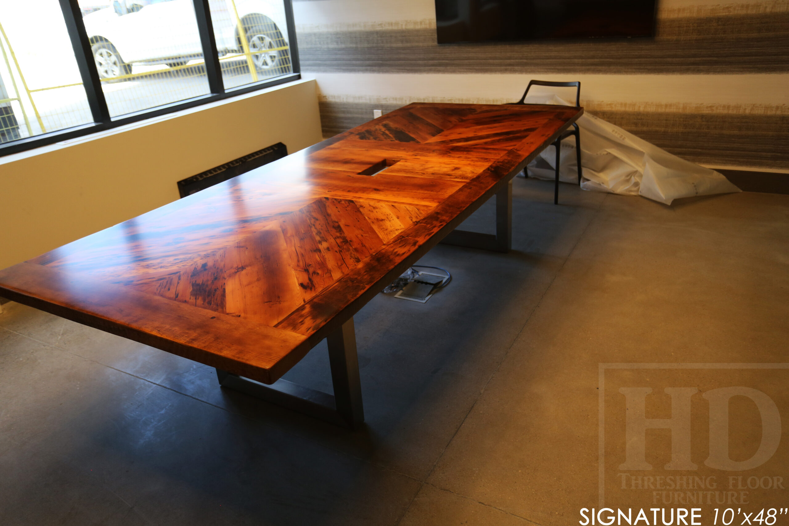 10' Reclaimed wood boardroom table made for a Maple, ON company - 48" wide - Hemlock Threshing Floor Construction - Original edges & distressing maintained - Customized joinery - Premium epoxy + satin polyurethane finish - Stainless Steel Base - www.table.ca