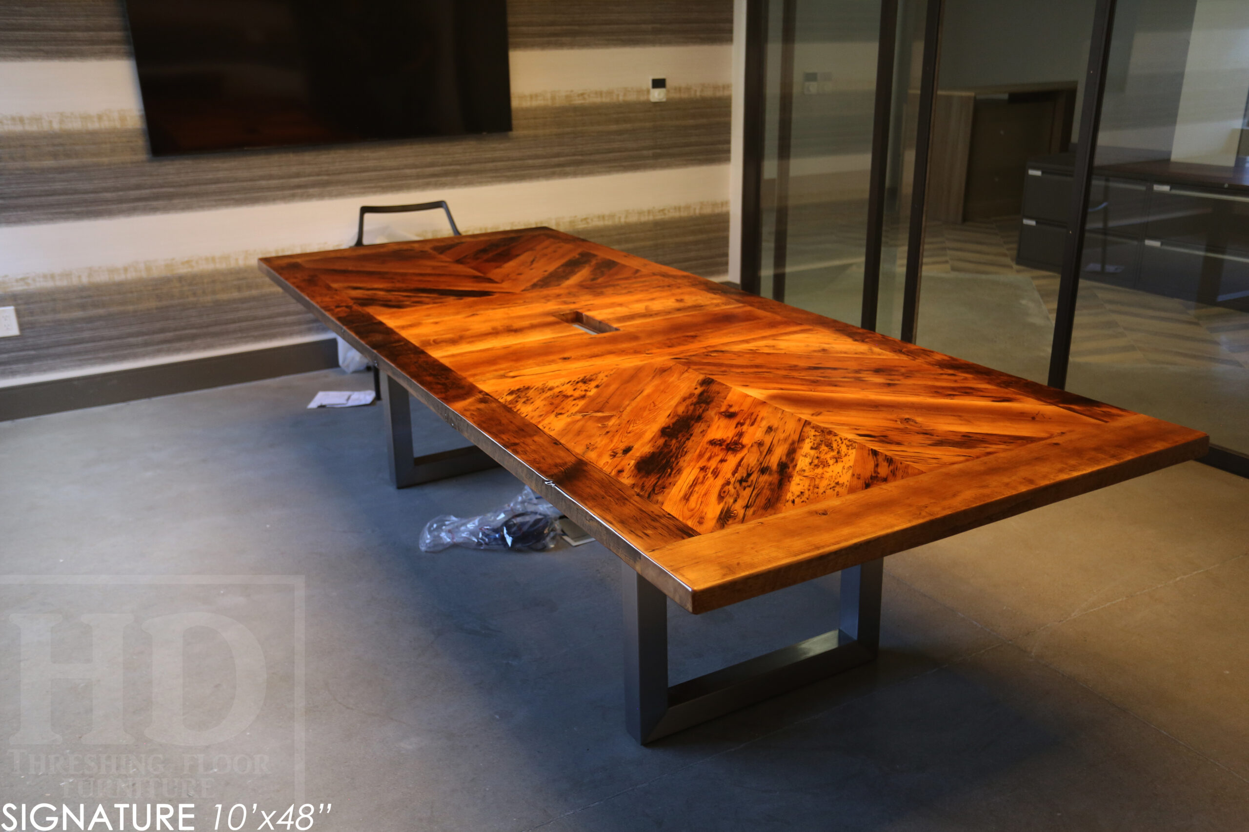 10' Reclaimed wood boardroom table made for a Maple, ON company - 48" wide - Hemlock Threshing Floor Construction - Original edges & distressing maintained - Customized joinery - Premium epoxy + satin polyurethane finish - Stainless Steel Base - www.table.ca