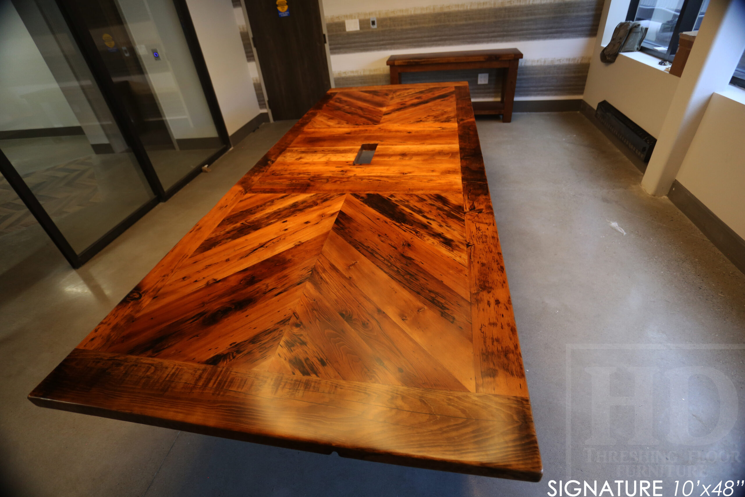 10' Reclaimed wood boardroom table made for a Maple, ON company - 48" wide - Hemlock Threshing Floor Construction - Original edges & distressing maintained - Customized joinery - Premium epoxy + satin polyurethane finish - Stainless Steel Base - www.table.ca