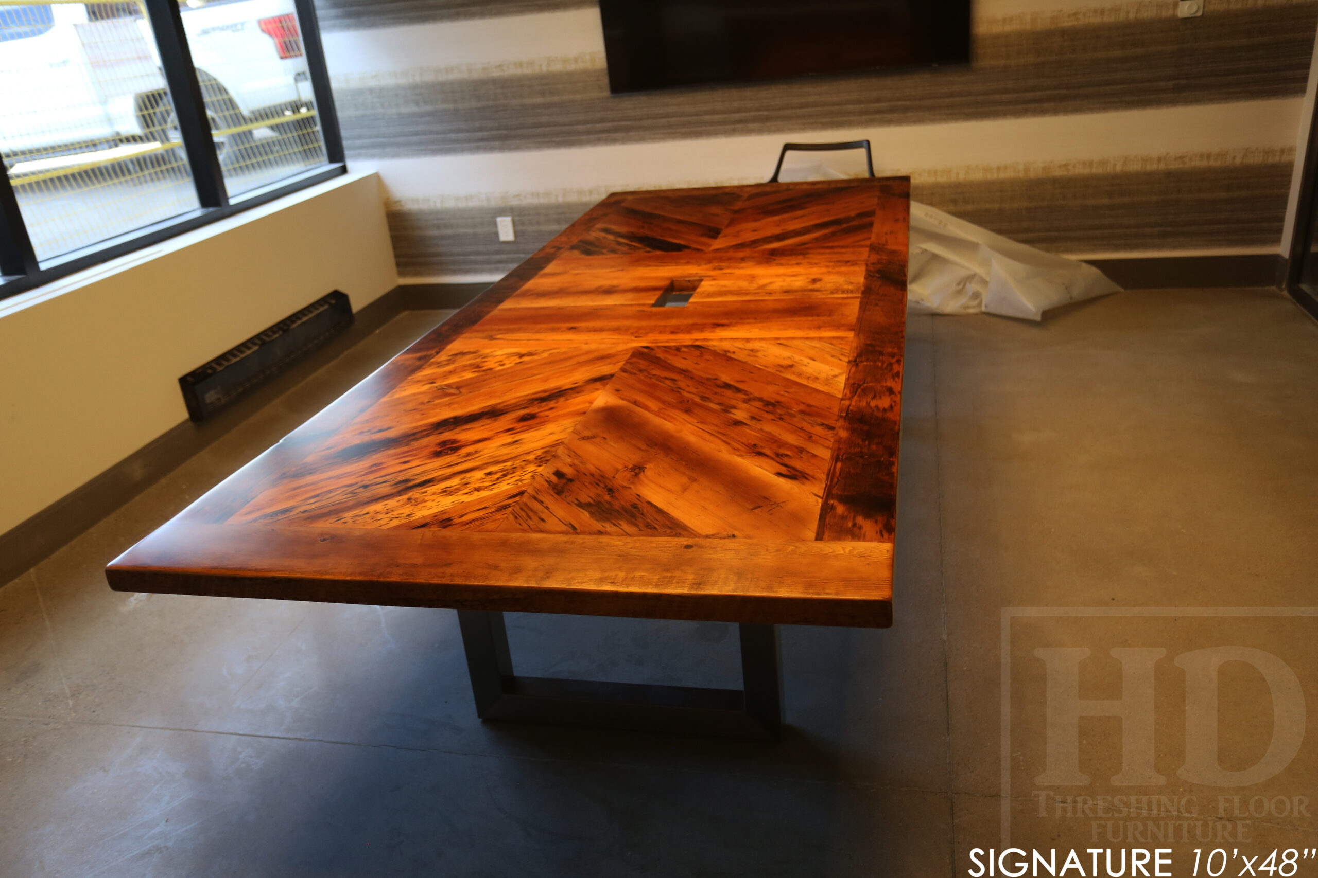 10' Reclaimed wood boardroom table made for a Maple, ON company - 48" wide - Hemlock Threshing Floor Construction - Original edges & distressing maintained - Customized joinery - Premium epoxy + satin polyurethane finish - Stainless Steel Base - www.table.ca