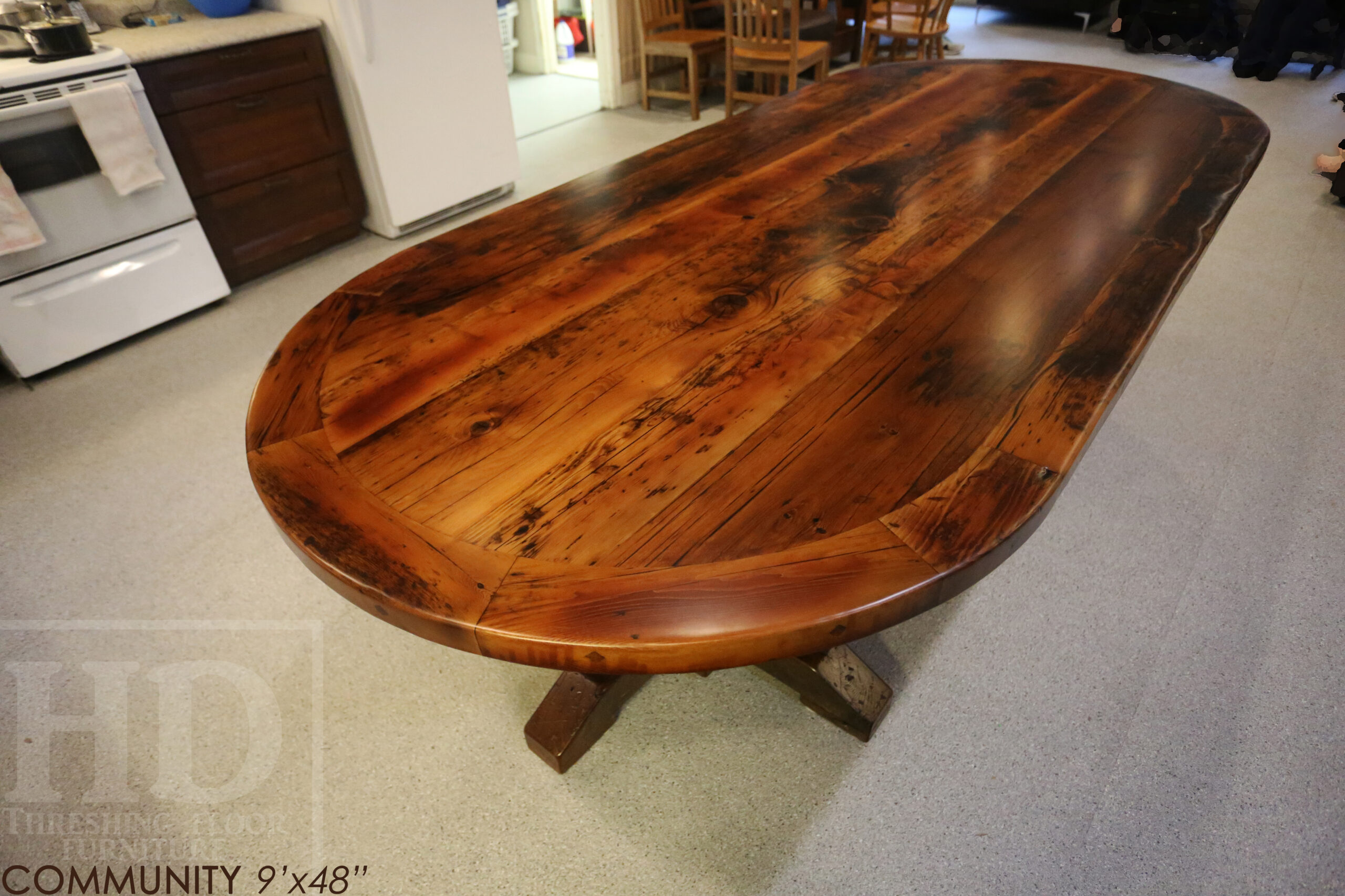 9' Ontario barnwood Oval table we made for an Port Hope, Ontario community centre - 48" wide - Hand-Hewn Beam Pedestals Base - 2" Hemlock Threshing Floor Top - Original edges & distressing maintained - Premium epoxy + satin polyurethane finish - www.table.ca