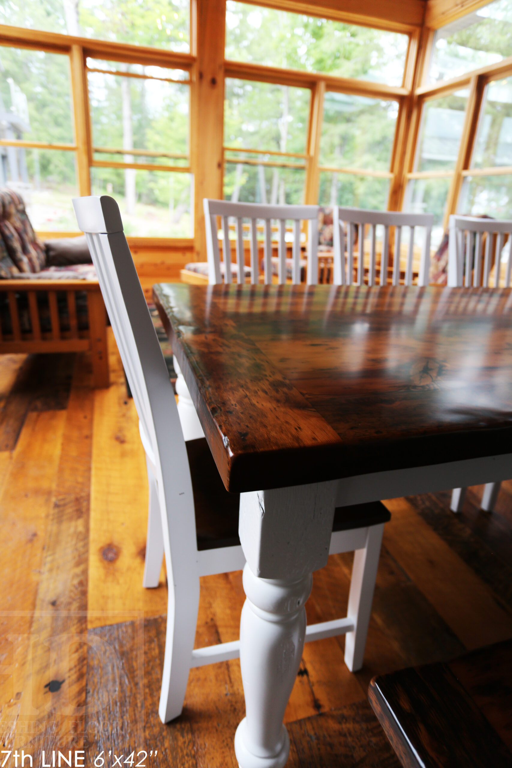 Details: 6' Reclaimed Wood Table we made for an Ontario cottage - 42" wide - Harvest Base - Turned Windbrace Beam Legs [painted white] - Old Growth Hemlock Threshing Floor Construction - Original edges & distressing maintained - Premium epoxy + satin polyurethane finish - 5' Trestle Bench - 5 Hudson Chairs / Wormy Maple / White Frame + Seat stained colour of table - www.table.ca