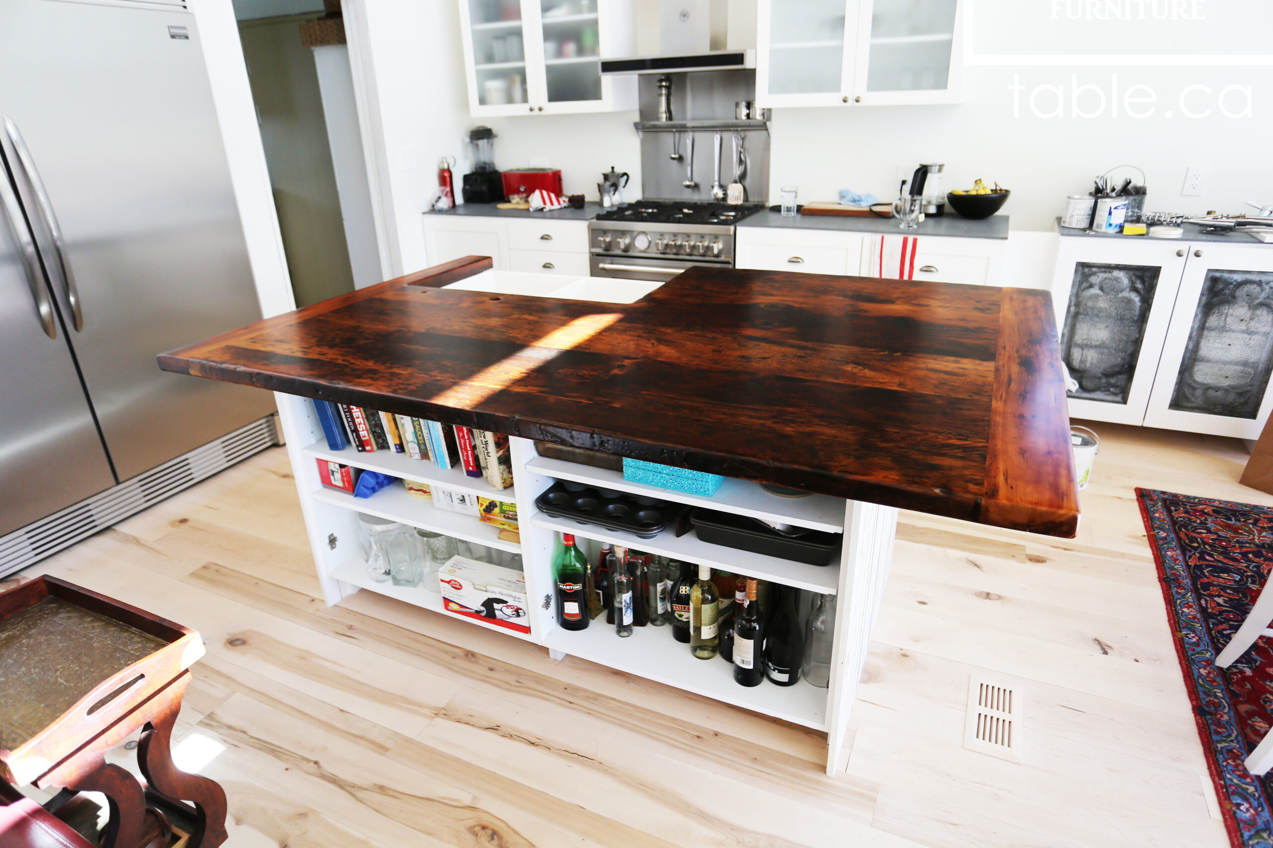 Custom Reclaimed Wood Island Top we made for a Wasaga Beach, Ontario Home - 2" Hemlock Threshing Floor Construction - Original Ontario barnwood edges & distressing maintained - Premium epoxy + satin polyurethane finish - www.table.ca