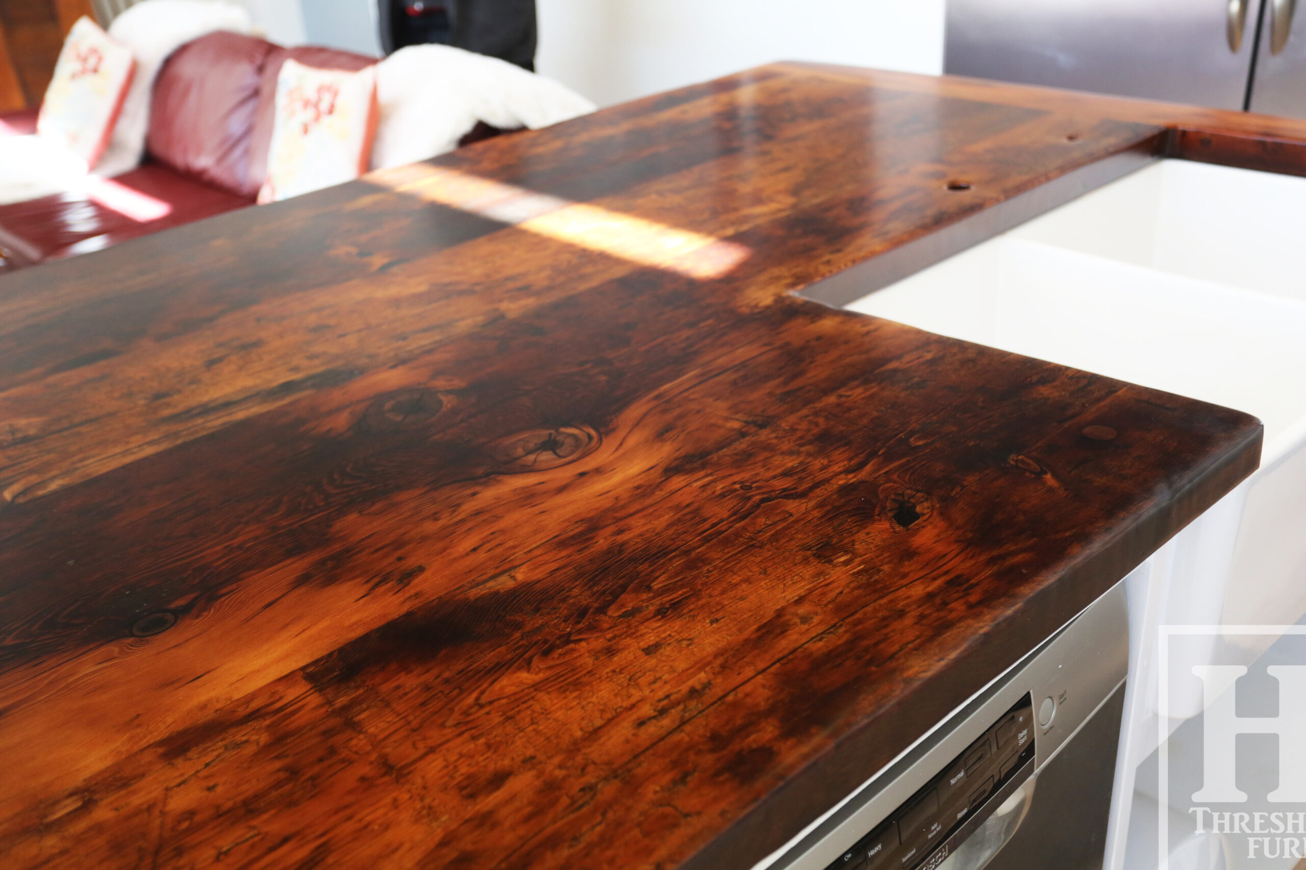 Custom Reclaimed Wood Island Top we made for a Wasaga Beach, Ontario Home - 2" Hemlock Threshing Floor Construction - Original Ontario barnwood edges & distressing maintained - Premium epoxy + satin polyurethane finish - www.table.ca