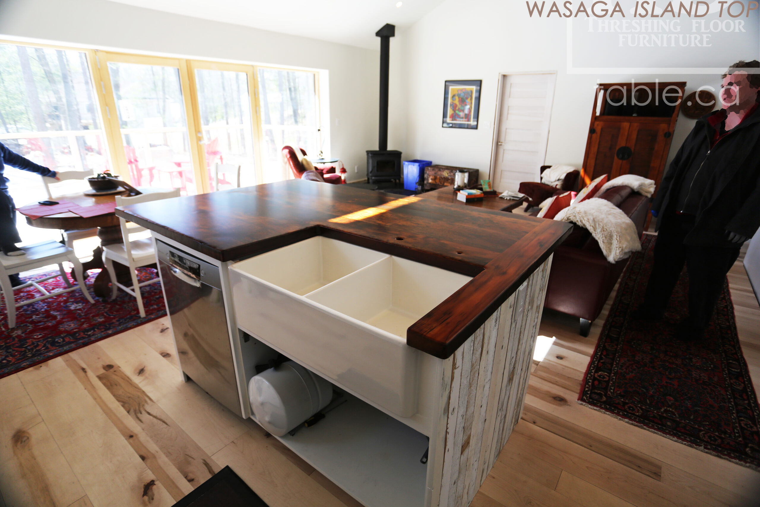 Custom Reclaimed Wood Island Top we made for a Wasaga Beach, Ontario Home - 2" Hemlock Threshing Floor Construction - Original Ontario barnwood edges & distressing maintained - Premium epoxy + satin polyurethane finish - www.table.ca