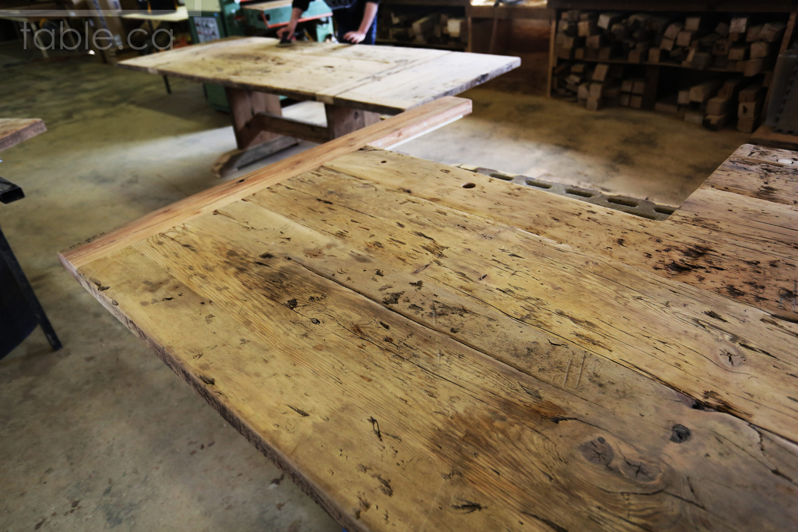 Custom Reclaimed Wood Island Top we made for a Wasaga Beach, Ontario Home - 2" Hemlock Threshing Floor Construction - Original Ontario barnwood edges & distressing maintained - Premium epoxy + satin polyurethane finish - www.table.ca